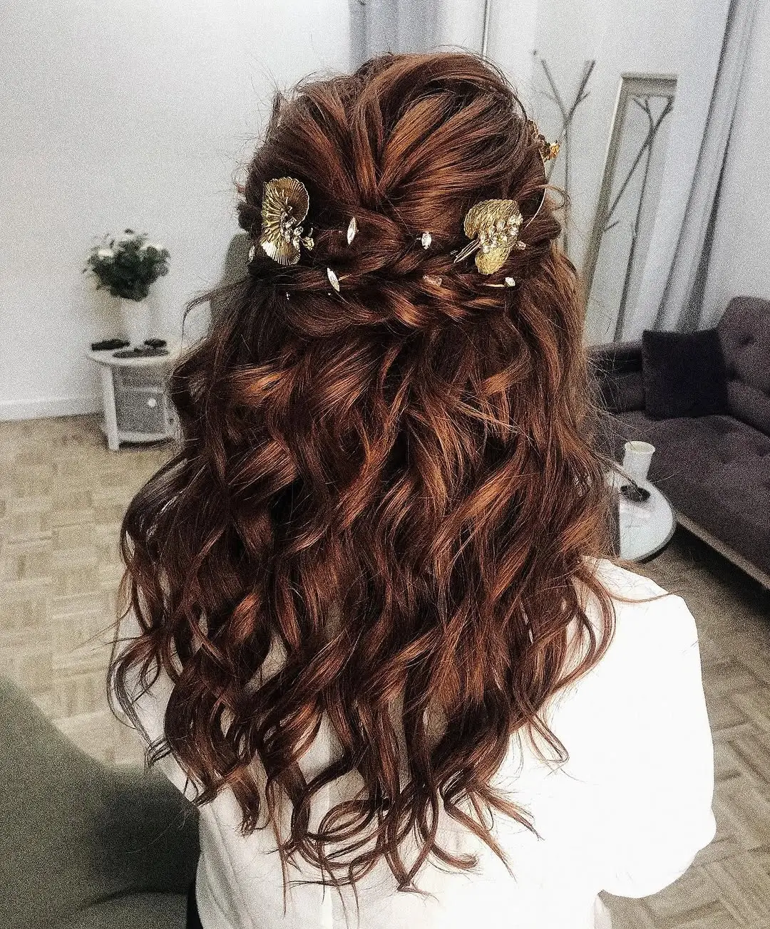 fall hairstyles 2026 Rich Auburn Waves with Elegant Twisted Details