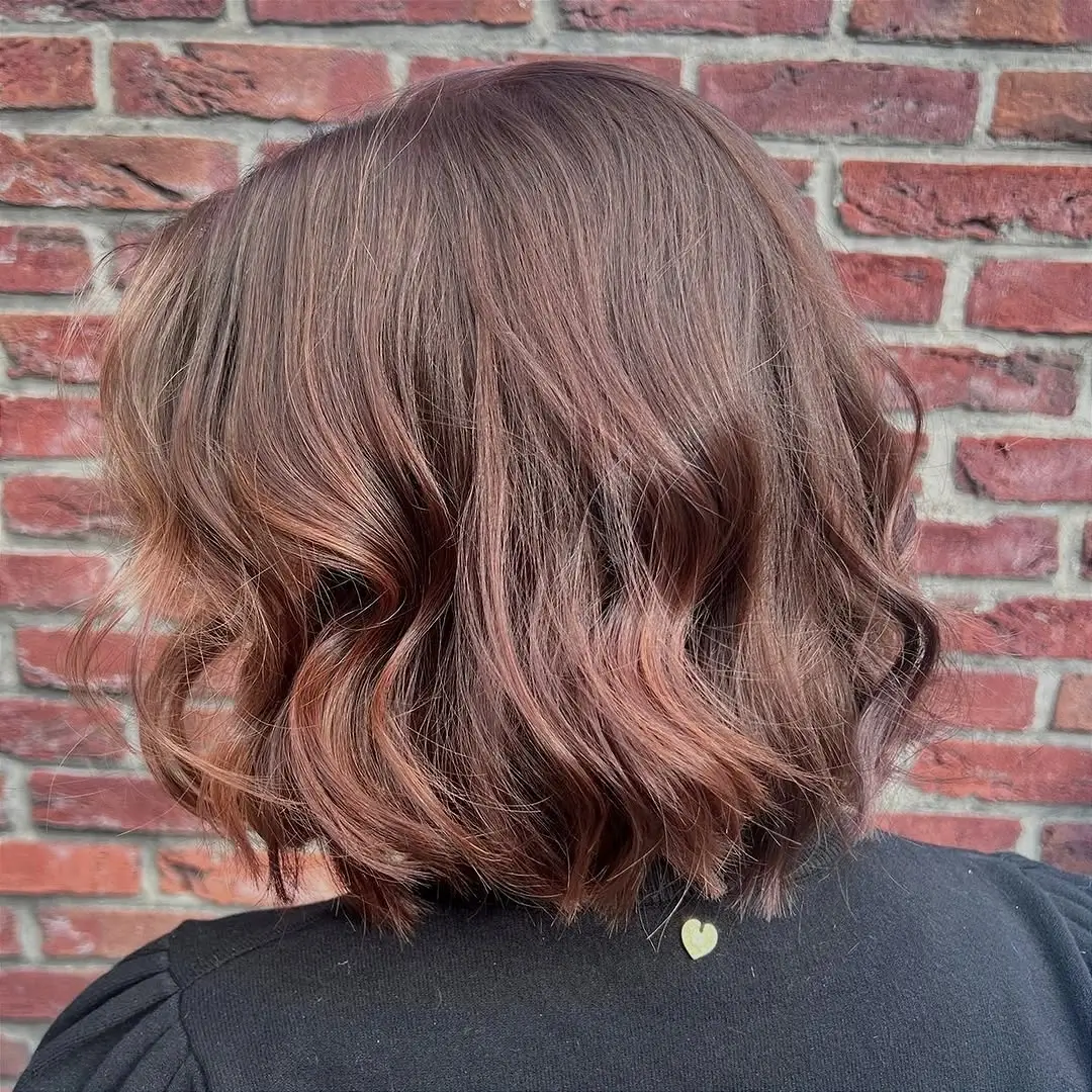 fall hairstyles 2026 Textured Chocolate Bob with Soft Autumn Waves
