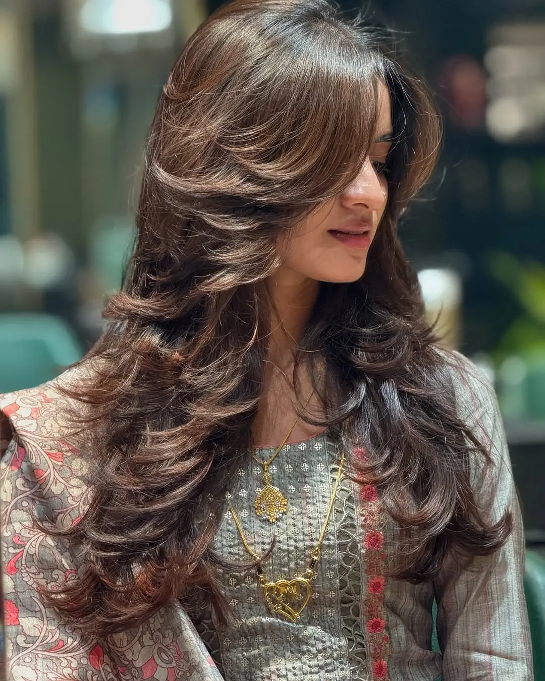 fall hairstyles for long hair 2026 Voluminous Feathered Layers With Glossy Brunette Shine