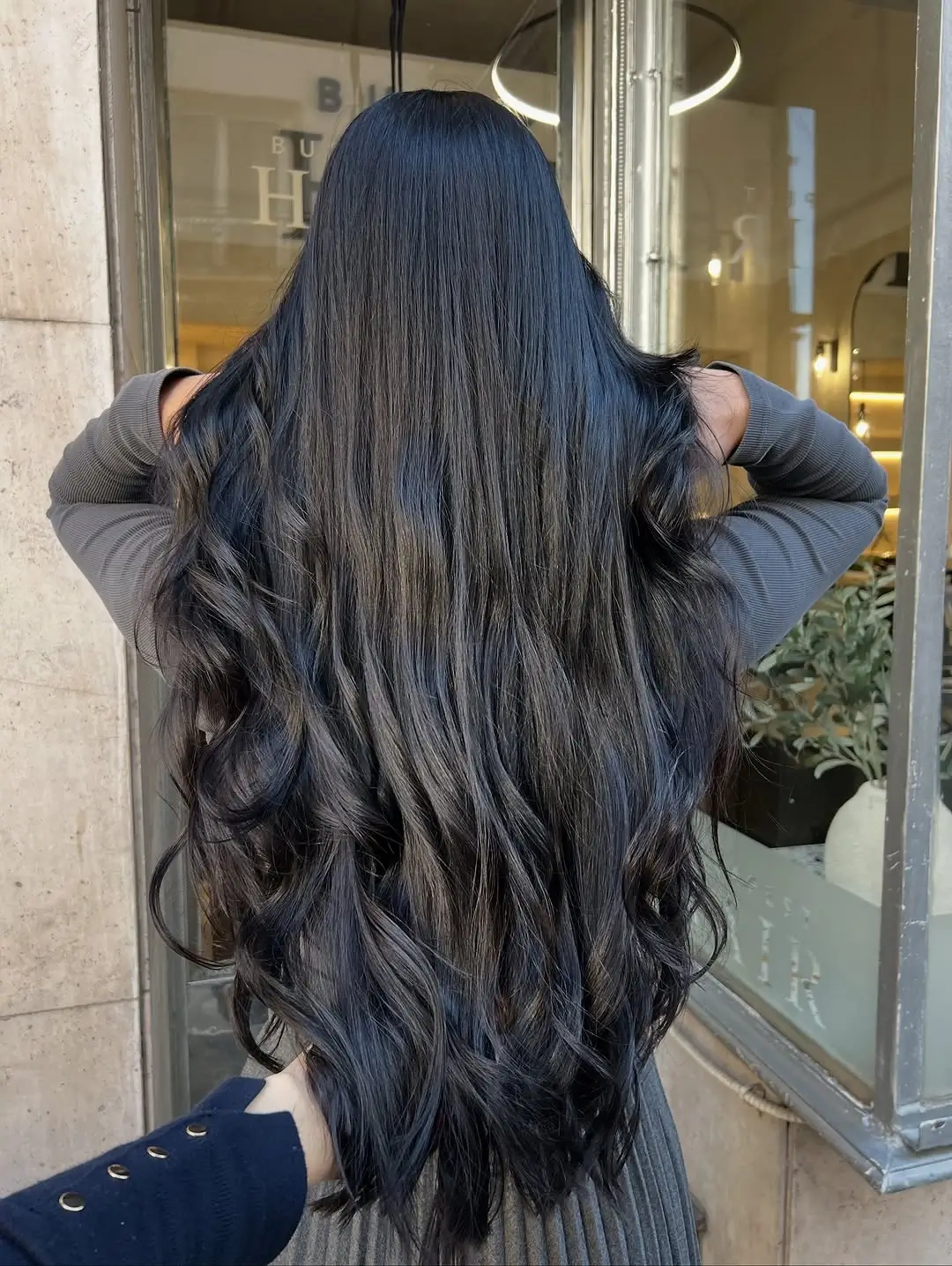 fall hairstyles for long hair 2026 Glossy Midnight Black Waves With a Sleek Finish