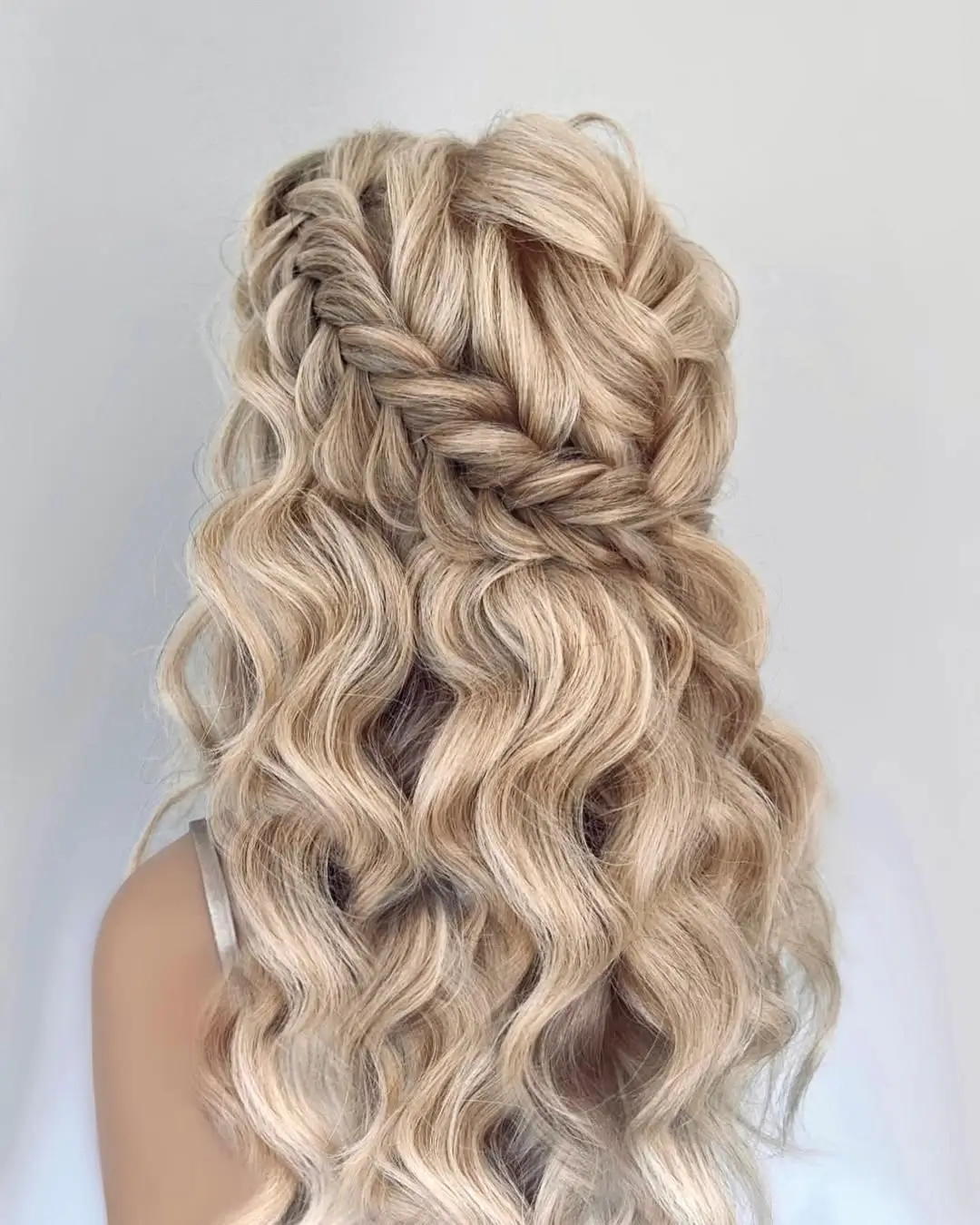 fall hairstyles for long hair 2026 Romantic Blonde Waterfall Braid With Soft Waves