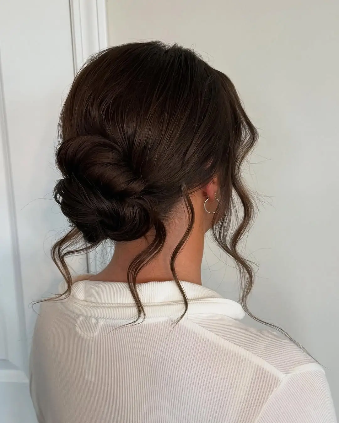 Fall hairstyles for office 2026 A Soft Twisted Bun for Everyday Professional Style