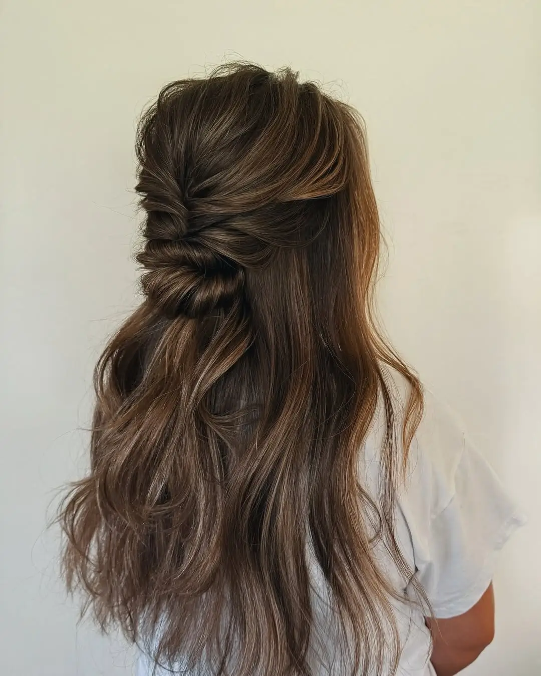 Fall hairstyles for office 2026 An Elegant Twisted Half-Up Style with Soft Waves