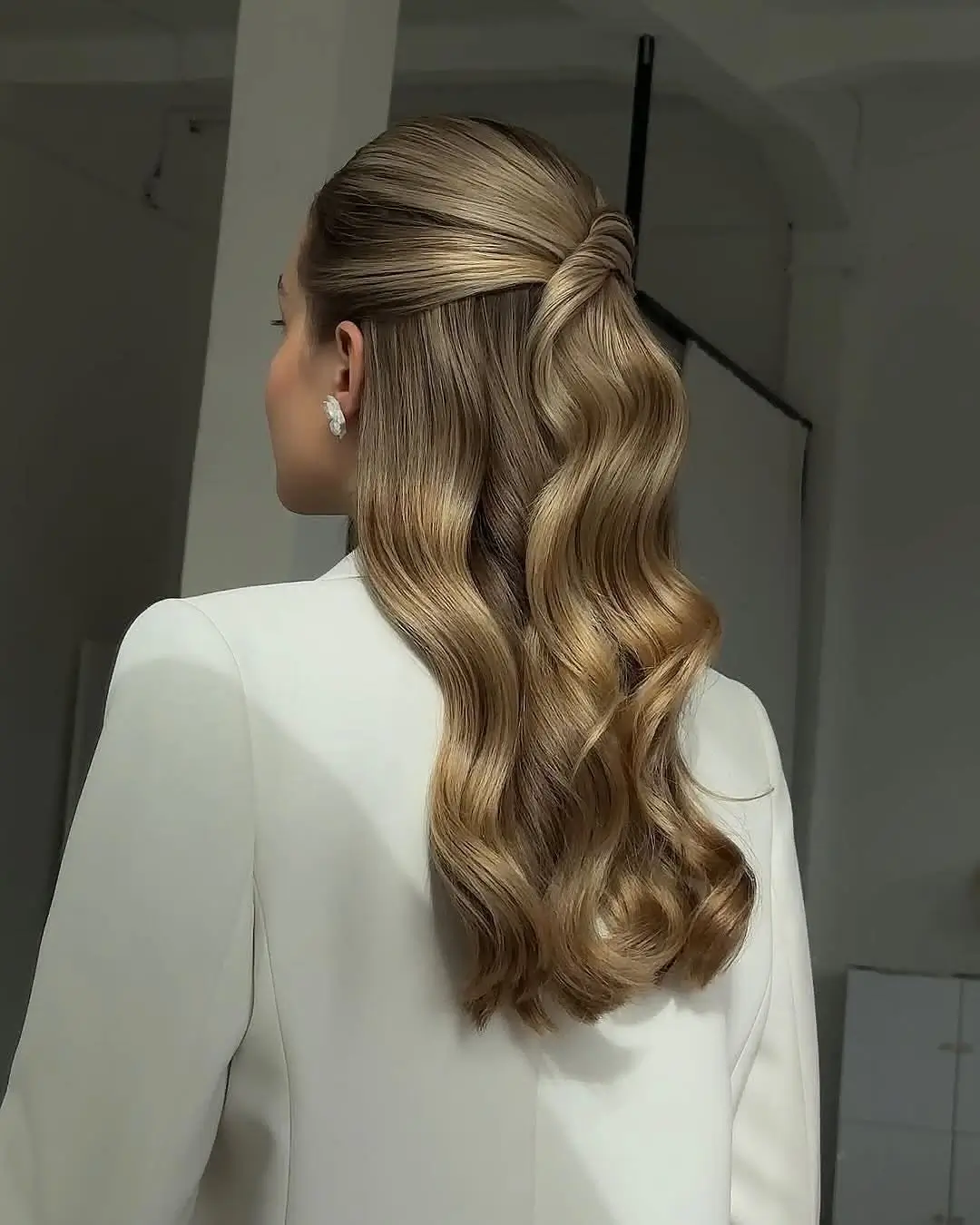 Fall hairstyles for office 2026 Soft Hollywood Waves with a Modern Half Ponytail