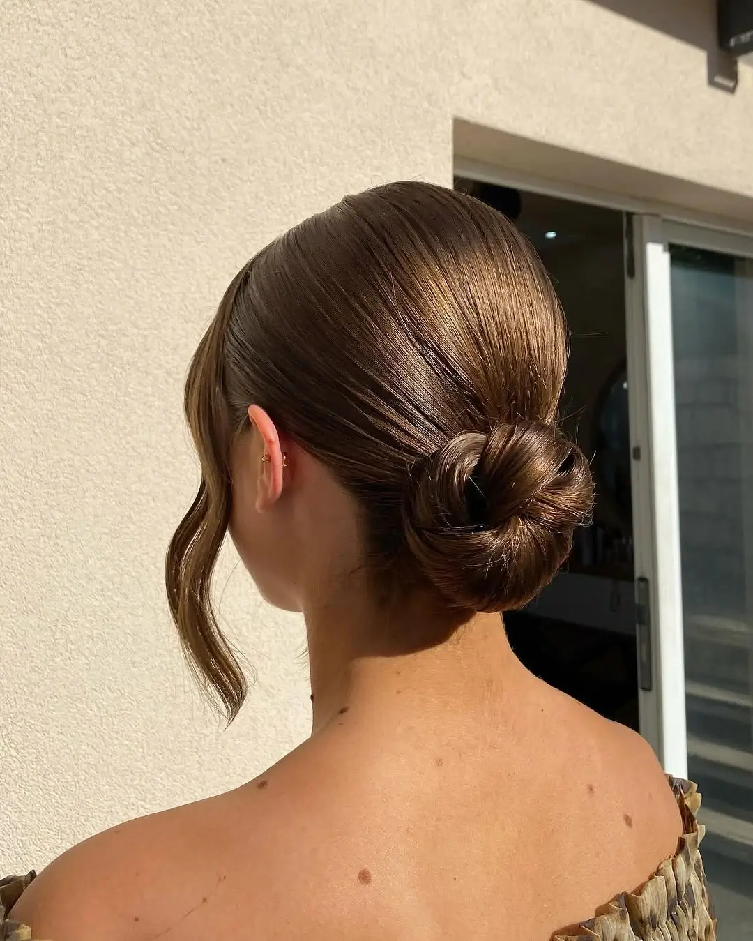 Fall hairstyles for office 2026 The Sleek Chignon That Never Goes Out of Style