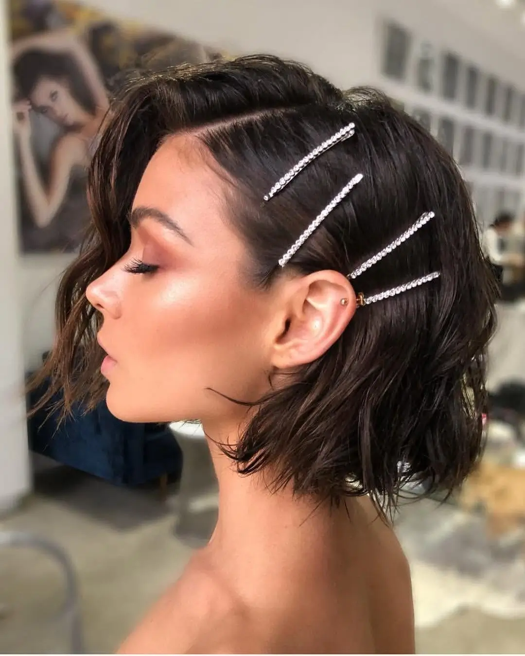 Fall hairstyles for wedding guests 2026 Chic Textured Bob with Sparkling Hair Pins