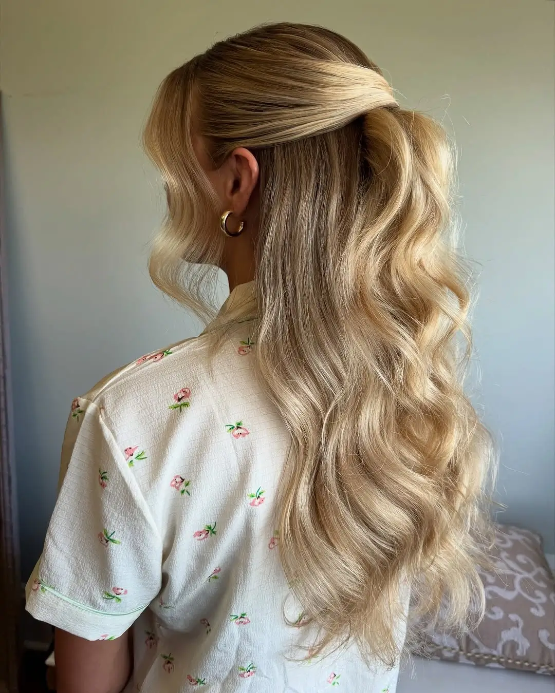 Fall hairstyles for wedding guests 2026 Soft Blonde Half Ponytail with Flowing Waves