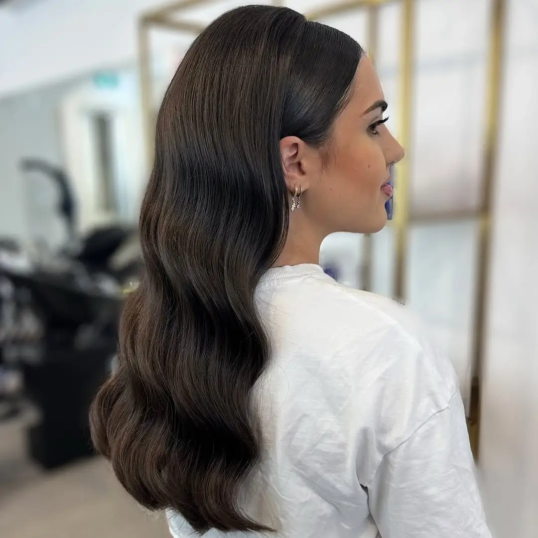 Fall hairstyles for wedding guests 2026 Glossy Hollywood Waves for Effortless Glamour