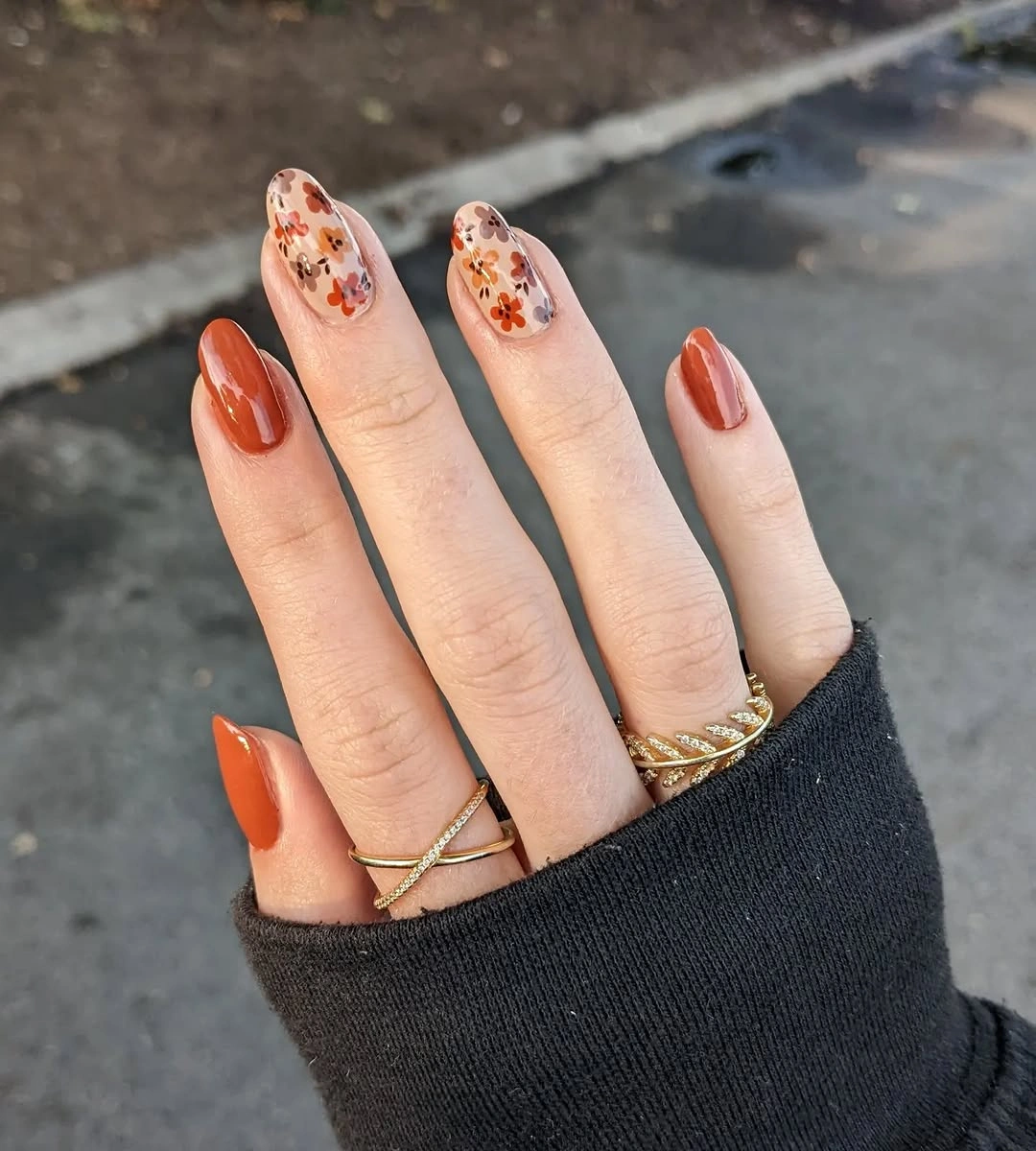 Fall medium nail ideas 2026 Rust Floral Nails That Celebrate Cozy Sweater Weather