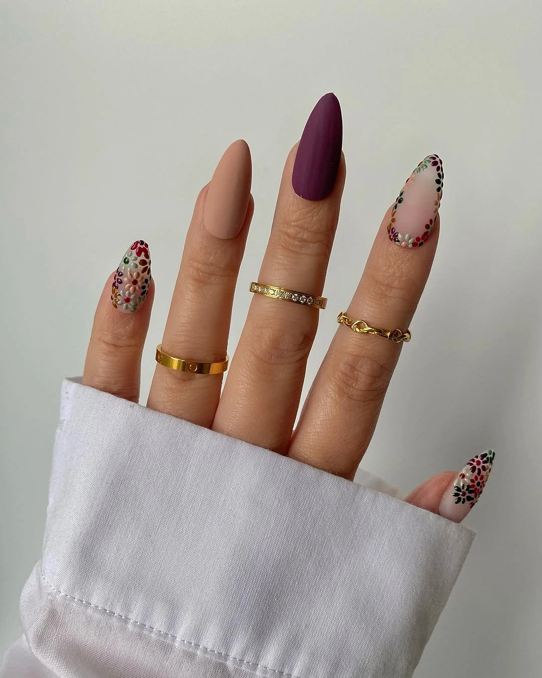Fall medium nail ideas 2026 Plum Matte Nails With Delicate Floral Dot Art
