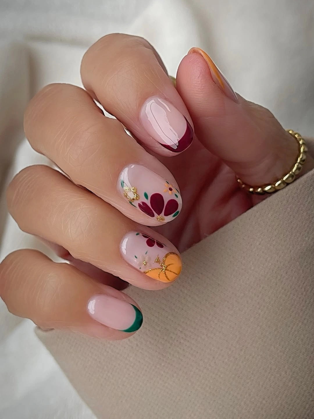 Fall medium nail ideas 2026 Minimal Floral Tips With Rich Berry Accents