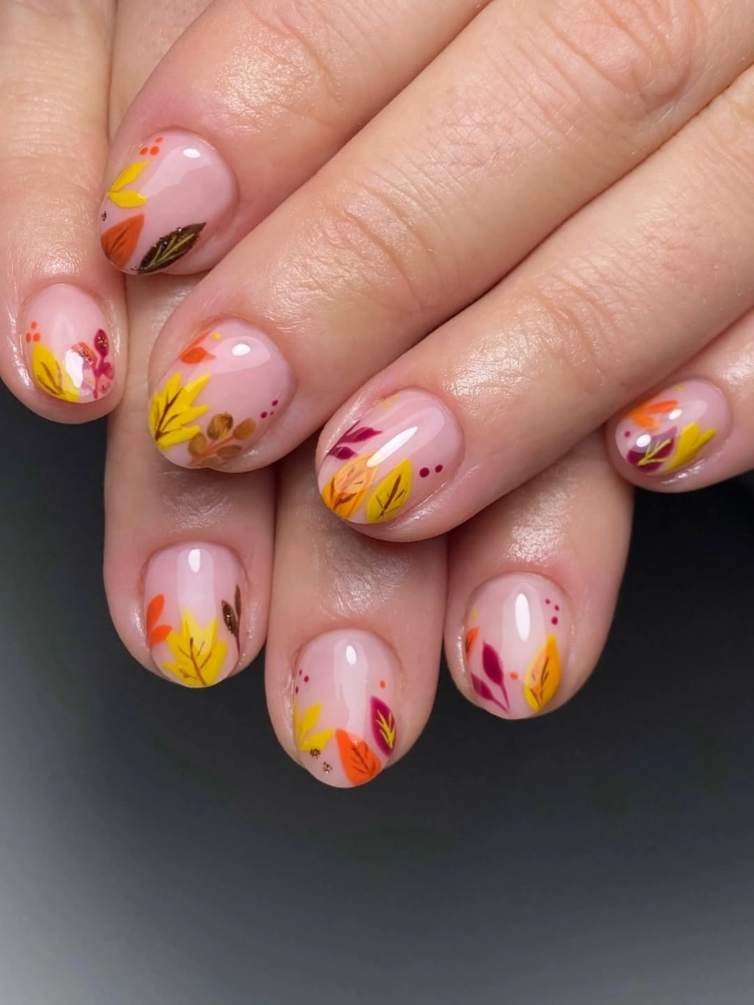 Fall nail art 2026 Colorful Botanical Leaves for a Fresh Early Autumn Look