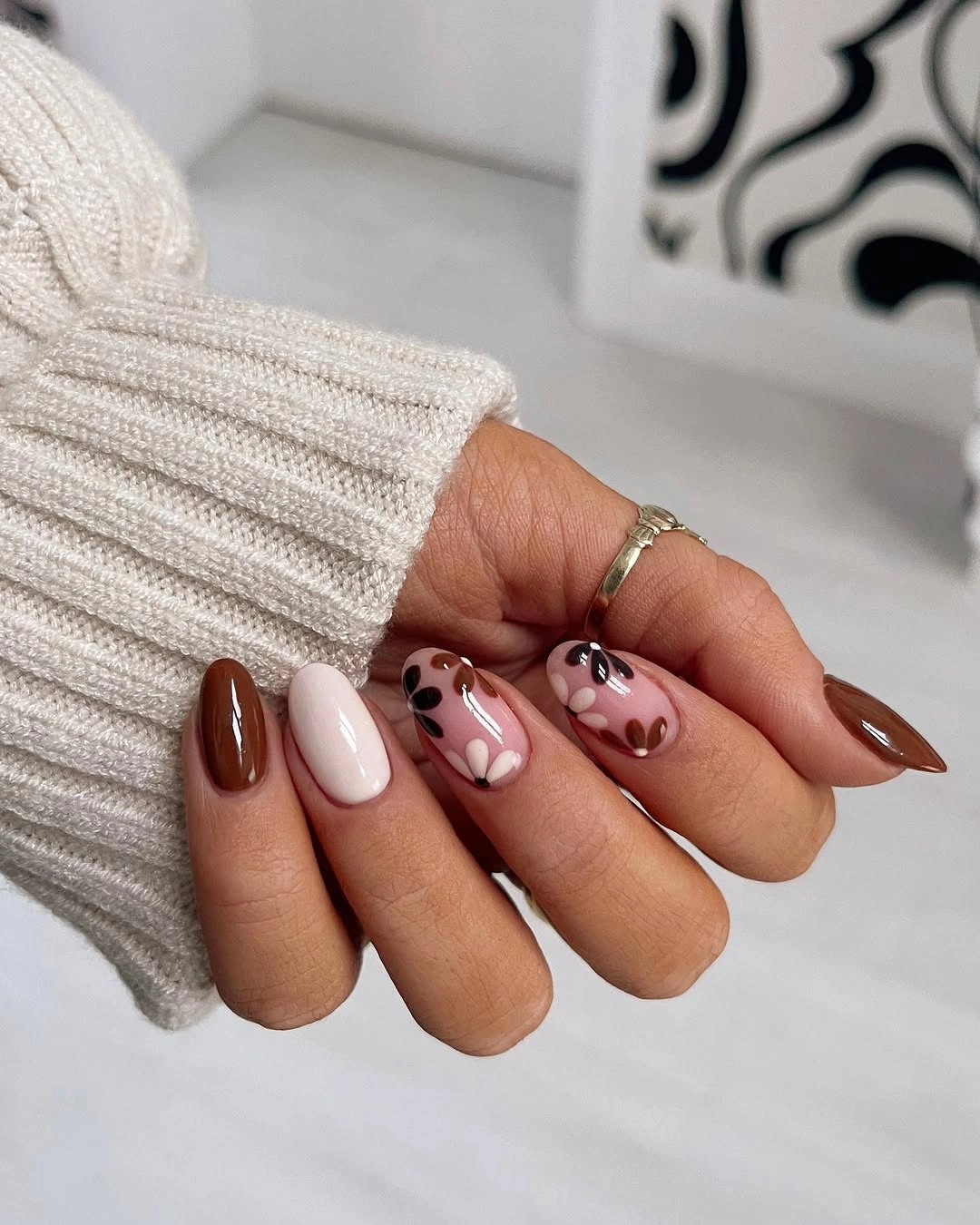 Fall nail art 2026 Chocolate Brown Floral Nails with Soft Neutral Contrast
