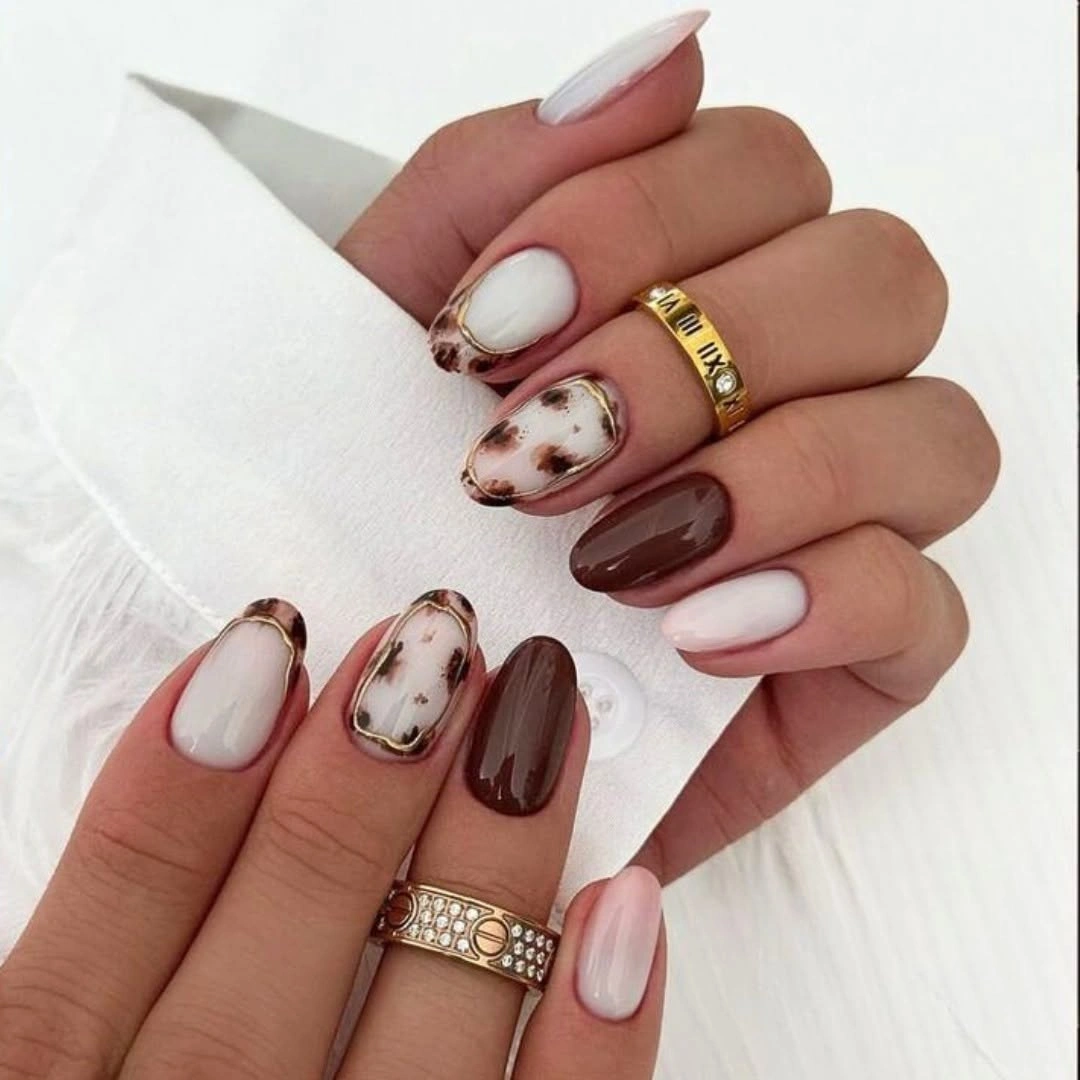 Fall nail art 2026 Mocha French Tips with Elegant Tortoiseshell Details