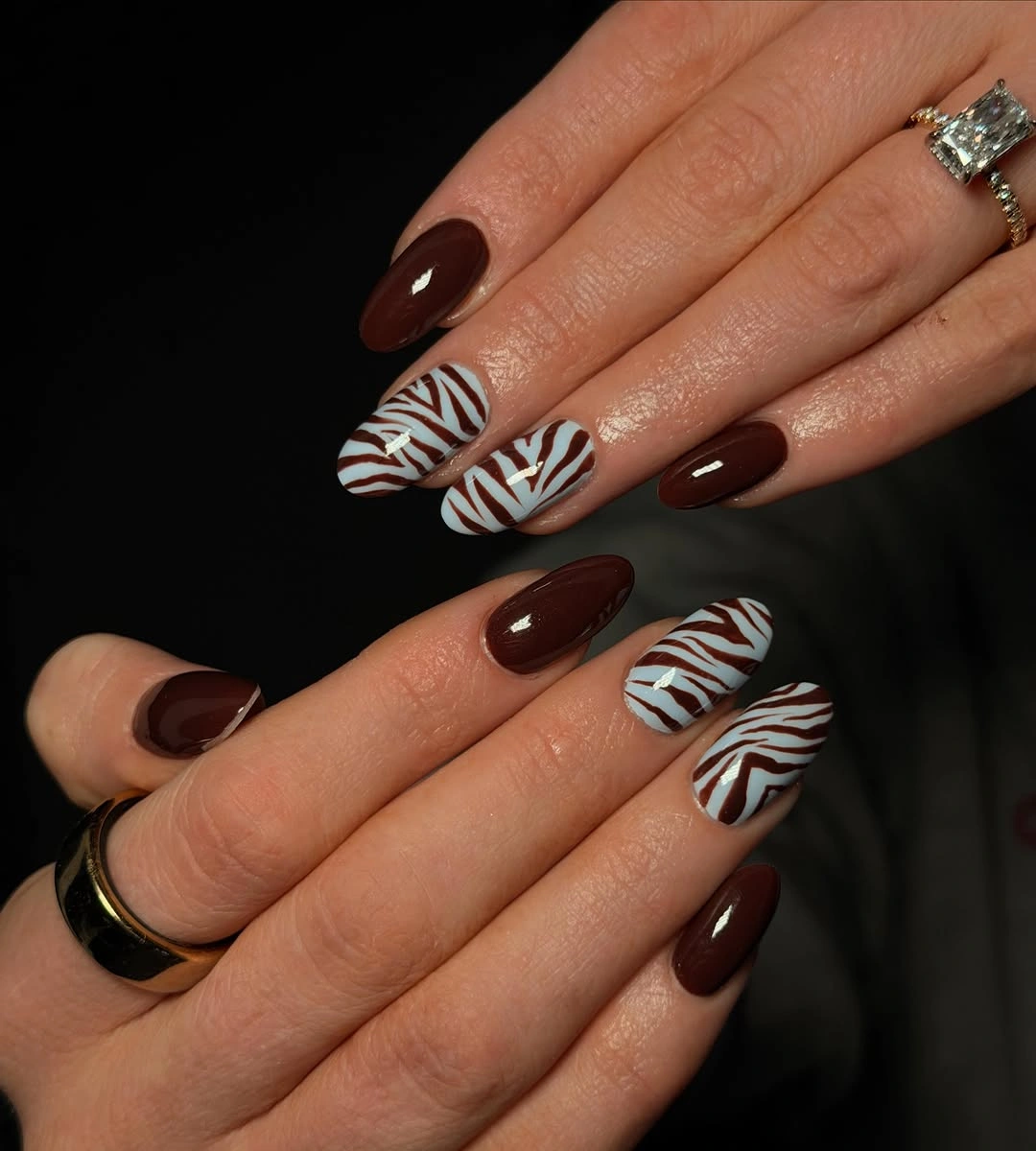 Fall nail art 2026 Chocolate Zebra Nails with Modern Animal Print