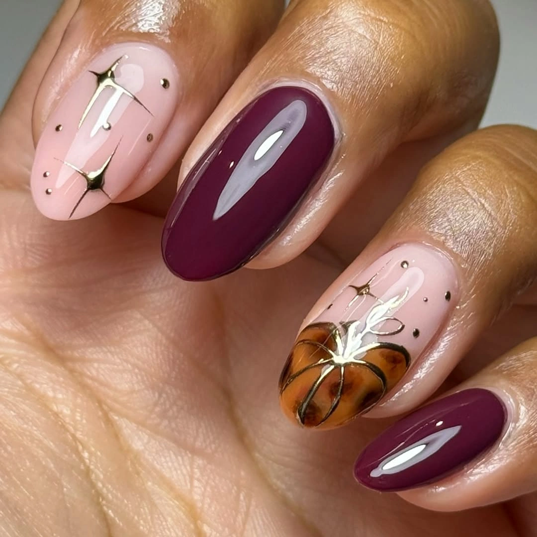 Fall Nail Designs for All Skin Tones 2026 Elegant Plum Pumpkin Nails With Delicate Gold Details