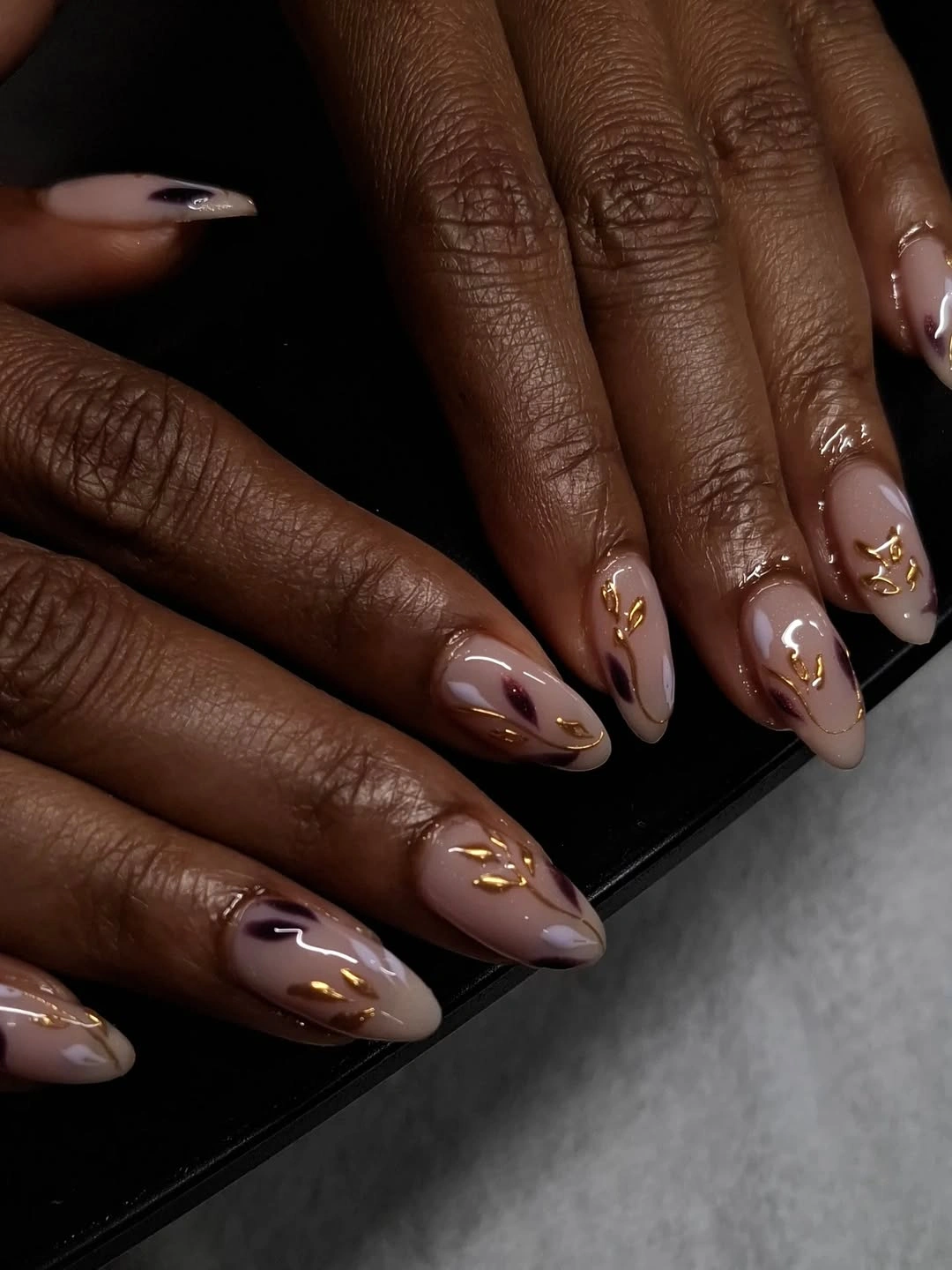 Fall Nail Designs for All Skin Tones 2026 Elegant Nude Almond Nails With Modern Gold Details