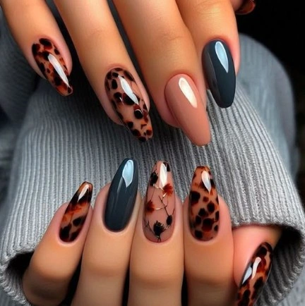 Fall Nail Designs for All Skin Tones 2026 Smoky Blue and Tortoiseshell Nails With Delicate Botanical Art