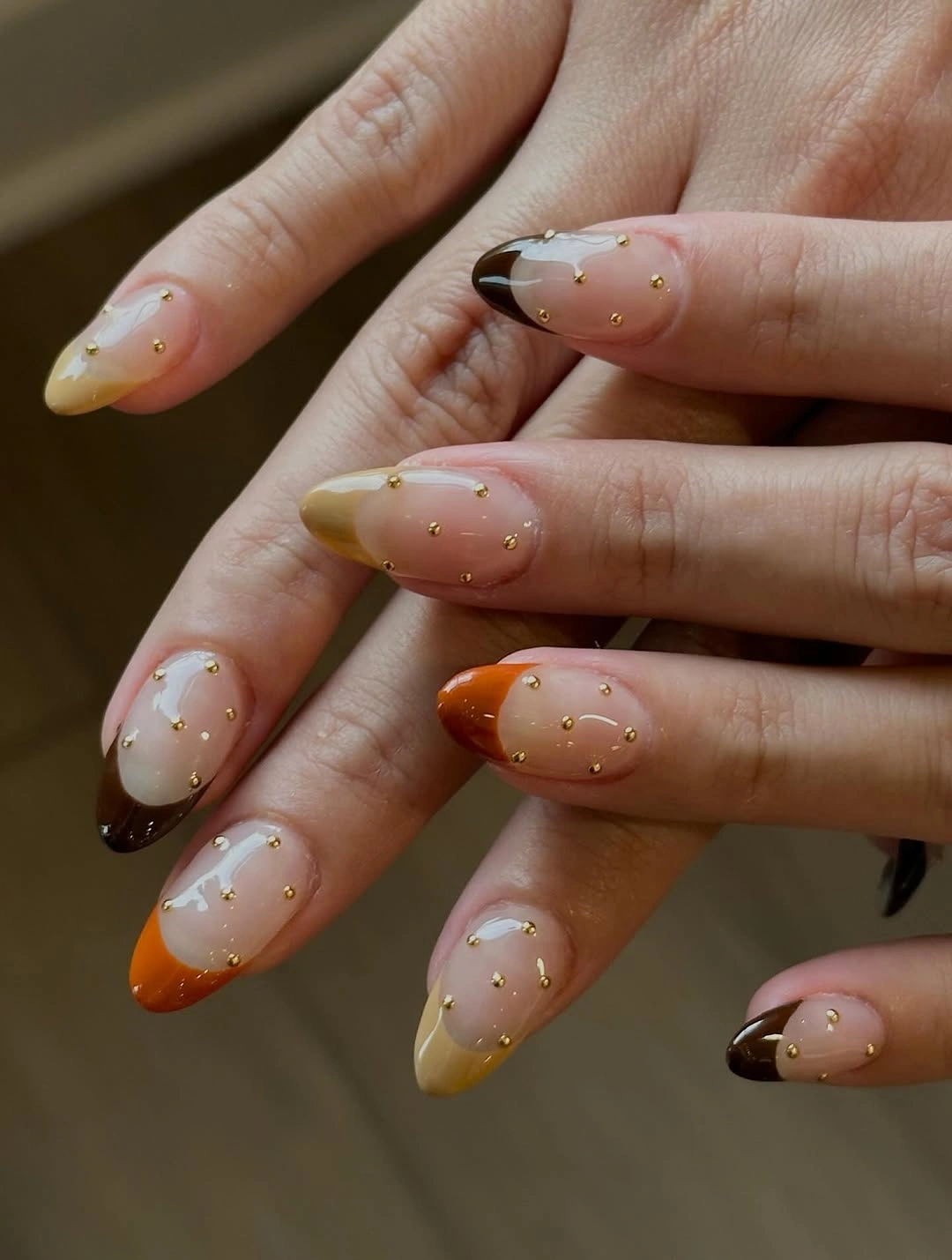 Fall Nail Designs for All Skin Tones 2026 Warm French Tips With Golden Studded Elegance