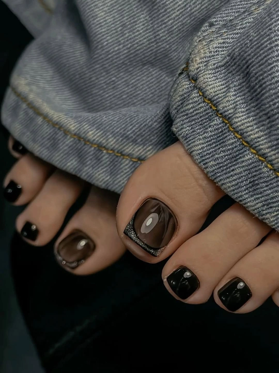 Fall pedicure ideas 2026 Smoky Espresso Cat Eye for Cozy Fall Evenings