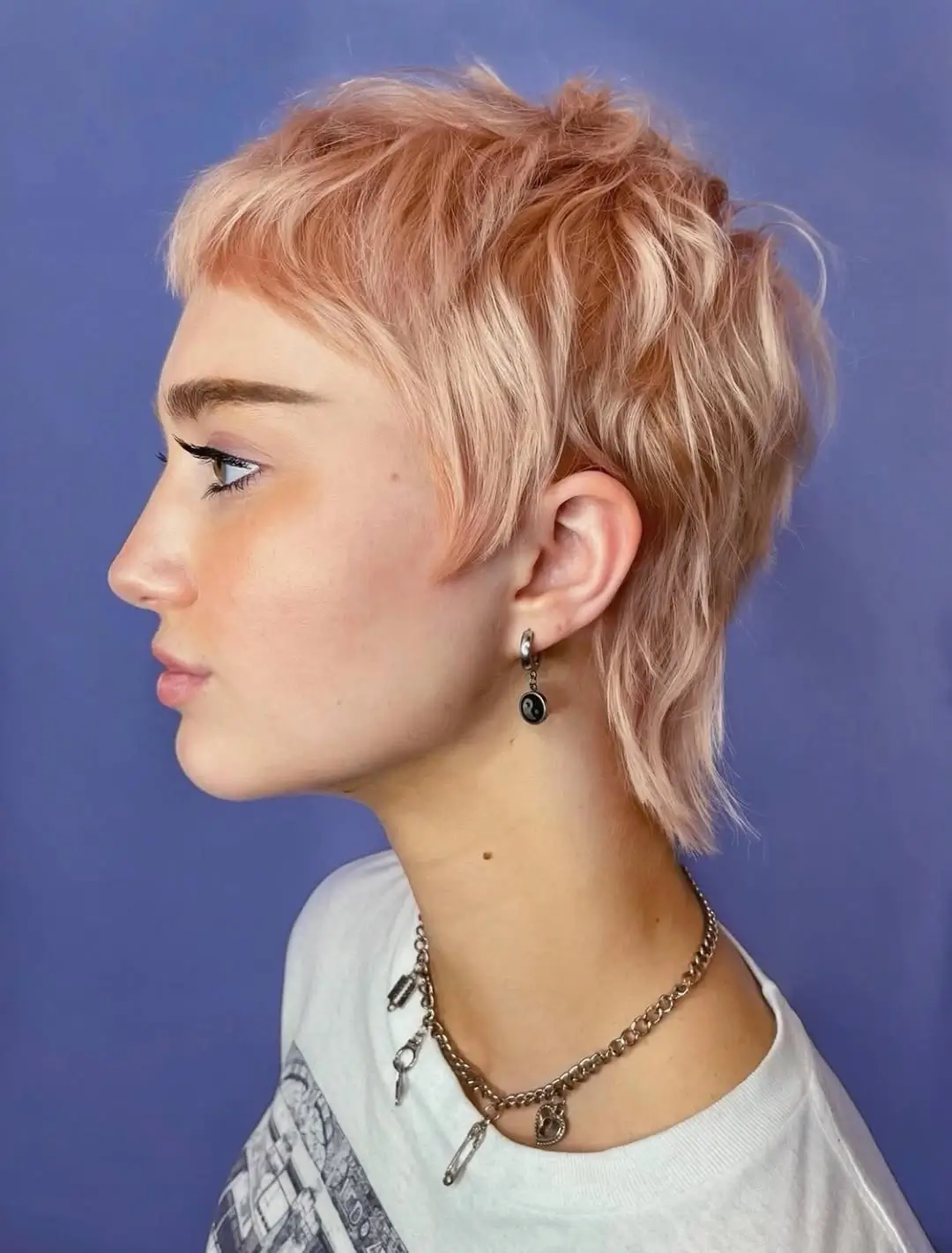 fall pixie haircut ideas 2026 Soft Peach Pixie Mullet With Playful Texture