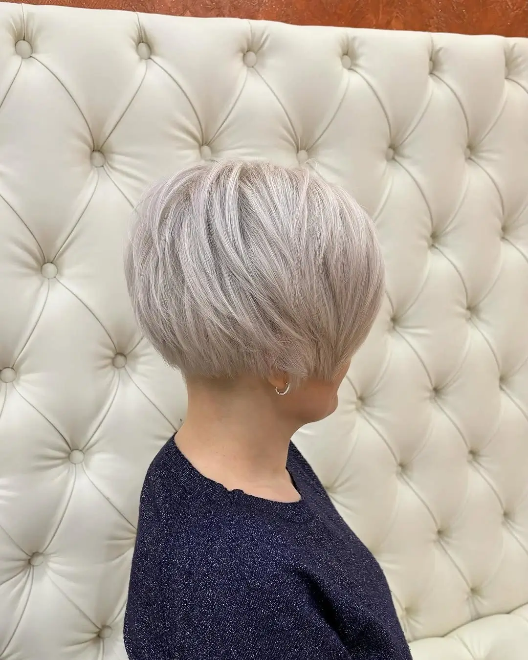 fall pixie haircut ideas 2026 Ice Blonde Rounded Pixie With Elegant Volume