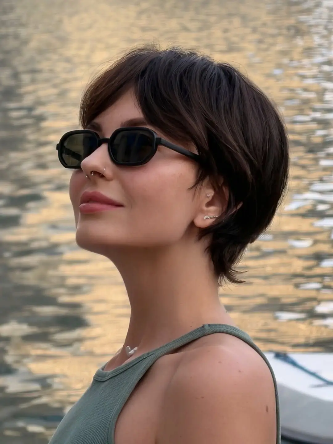 fall pixie haircut ideas 2026 Soft Brunette Bixie With Wispy Nape Layers