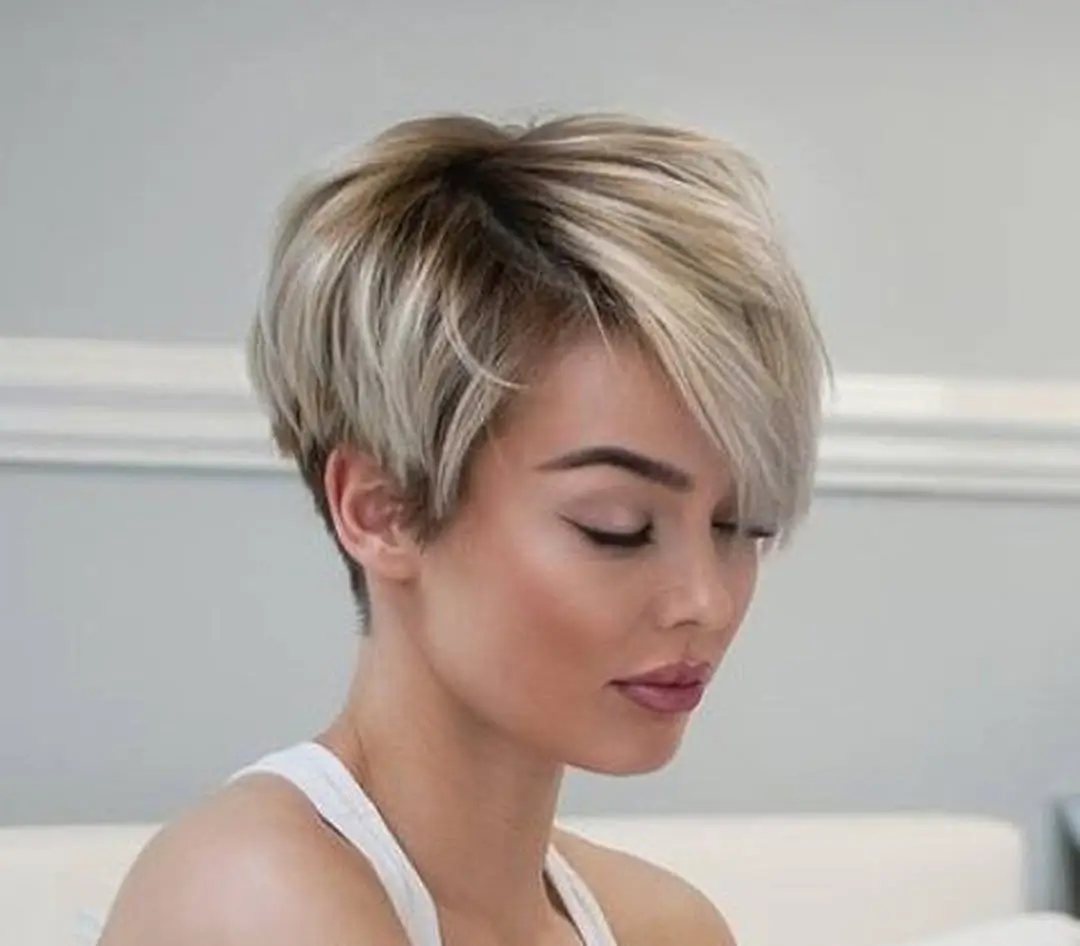 fall pixie haircut ideas 2026 Side Swept Champagne Pixie With Modern Texture