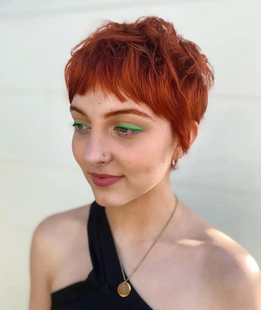 fall pixie haircut ideas 2026 Vibrant Copper Pixie That Brightens Gray Autumn Days
