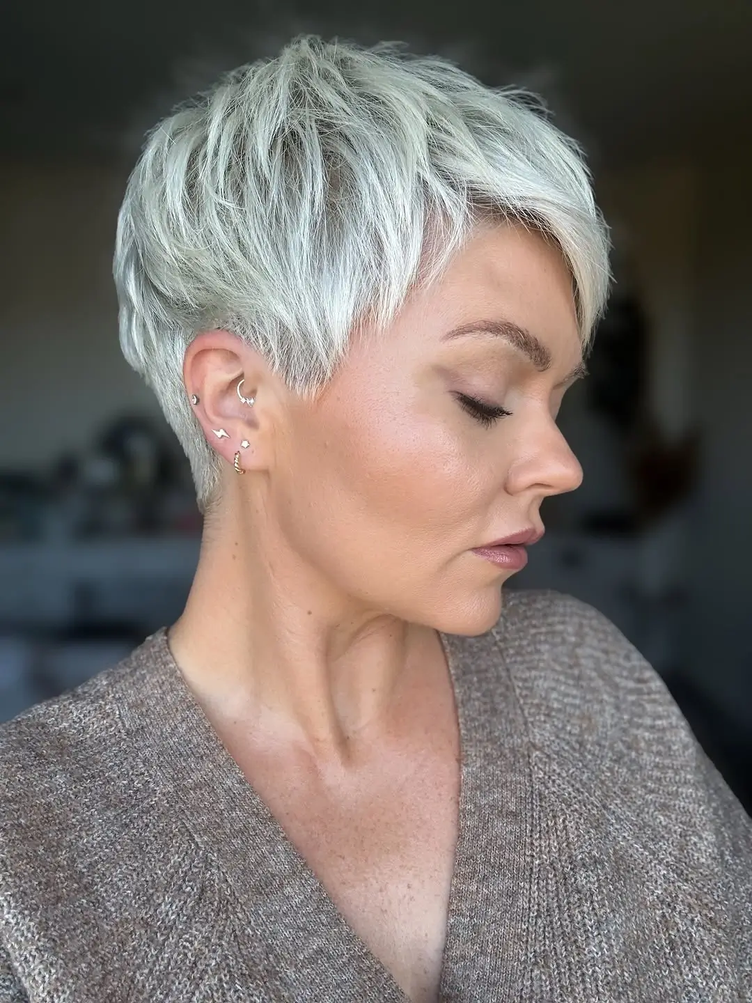 fall pixie haircut ideas 2026 Frosted Silver Pixie With Airy Texture