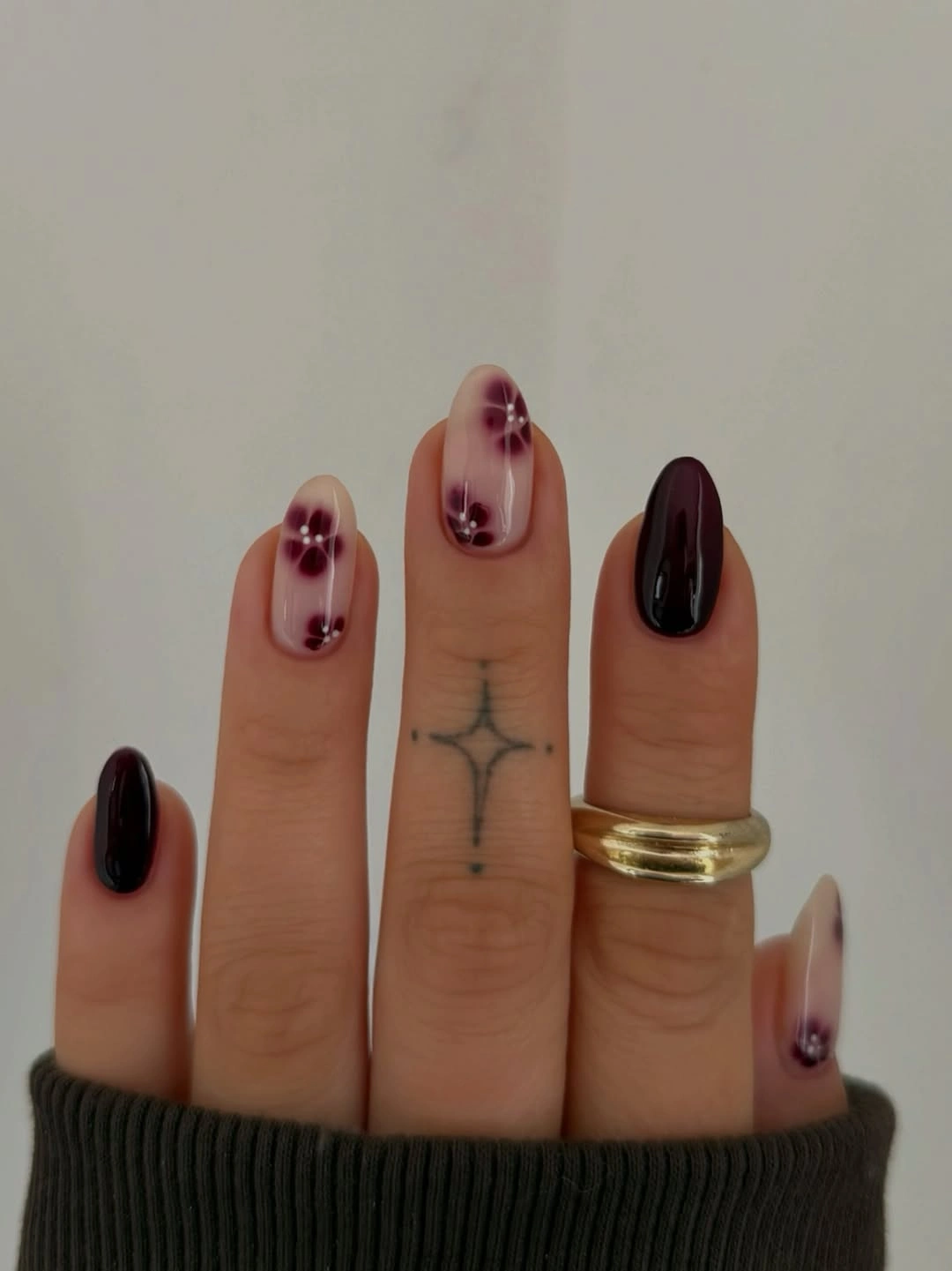 Fall red nails 2026 Dark Plum Floral Nails With a Romantic Autumn Mood