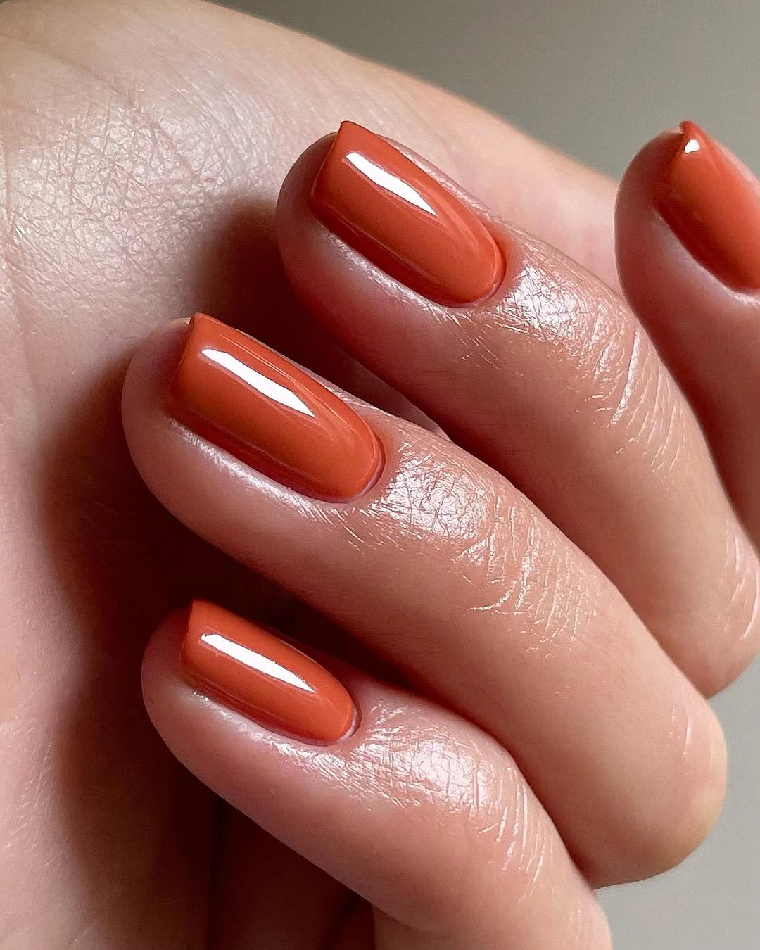 Fall short nails 2026 Glossy Cinnamon Nails That Brighten Early Fall
