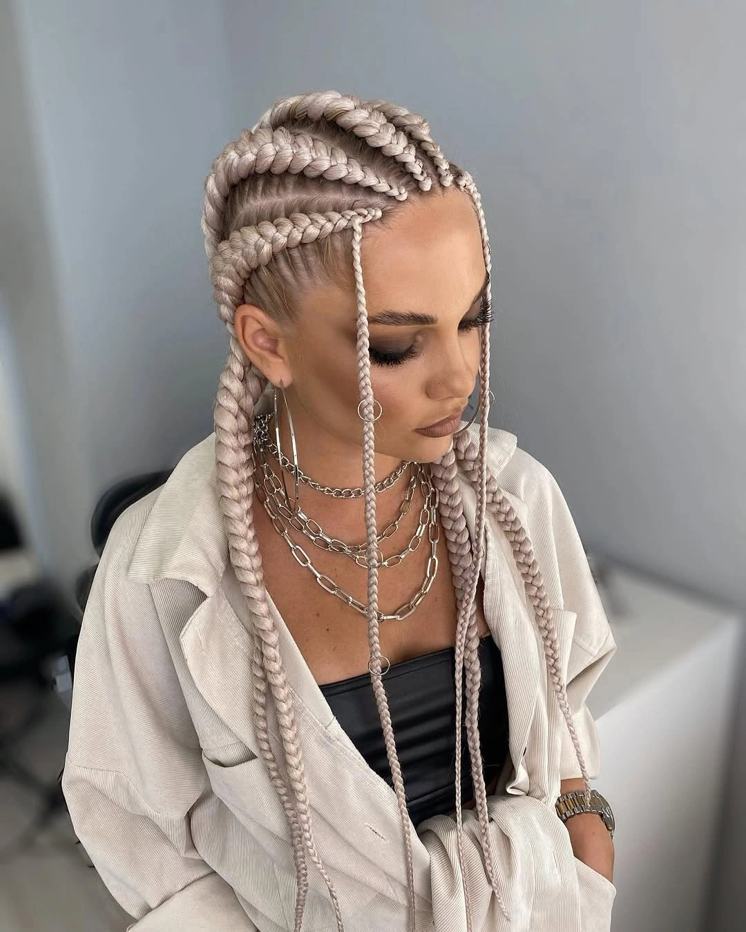 feed in braid hairstyles Platinum Feed In Braids with Bold Statement Sections