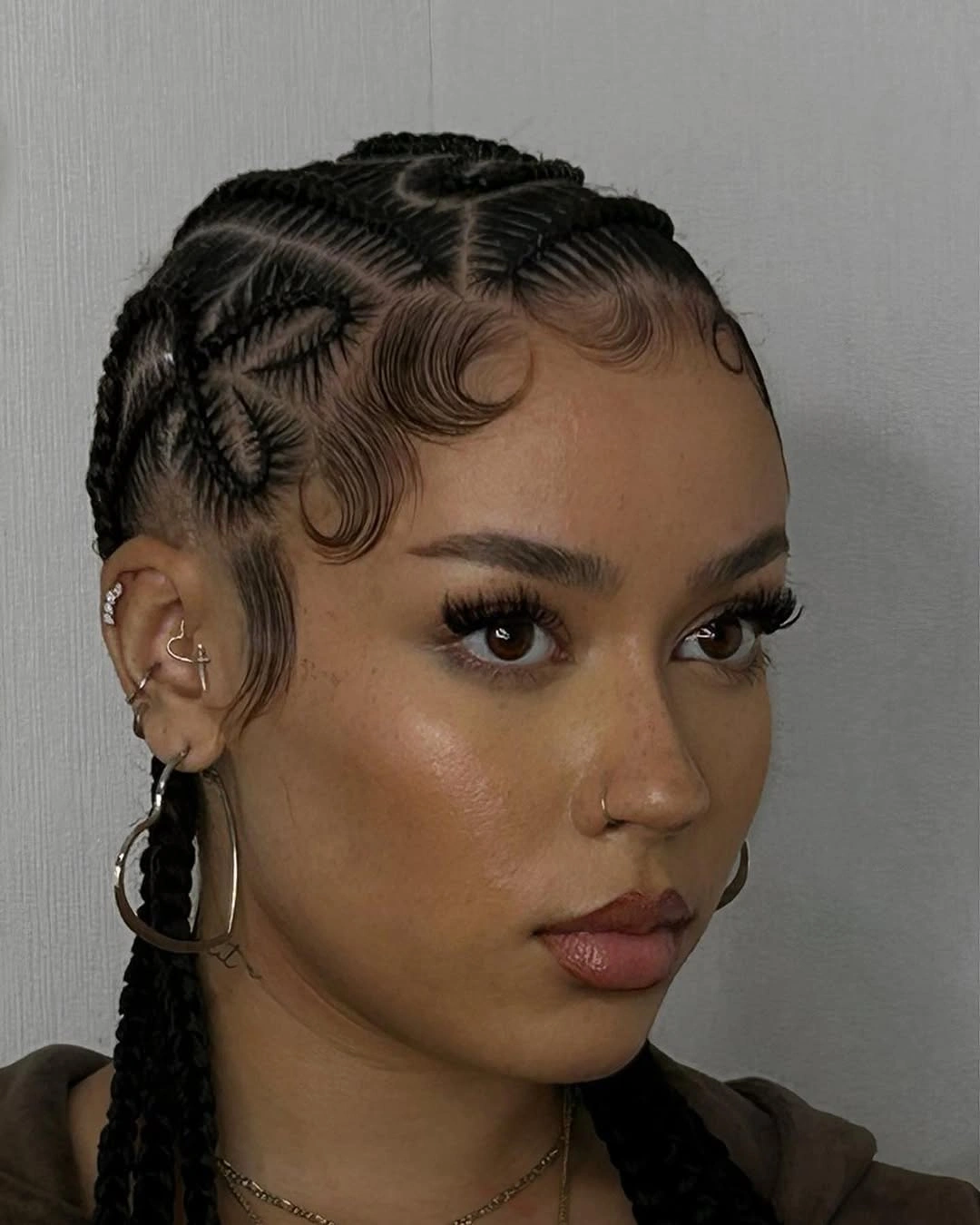 feed in braid hairstyles Creative Feed In Braids with Swirling Front Details