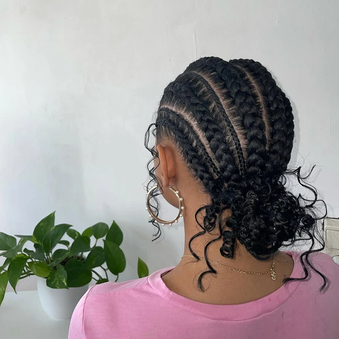 feed in braid hairstyles Low Curly Bun with Feed In Braids