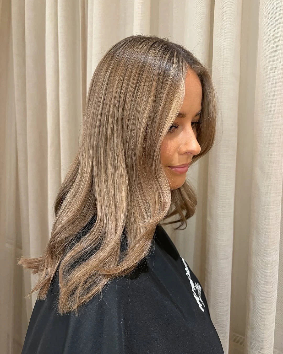 full head babylights blonde on brown hair Cool Beige Babylights With Sleek Shoulder-Length Layers