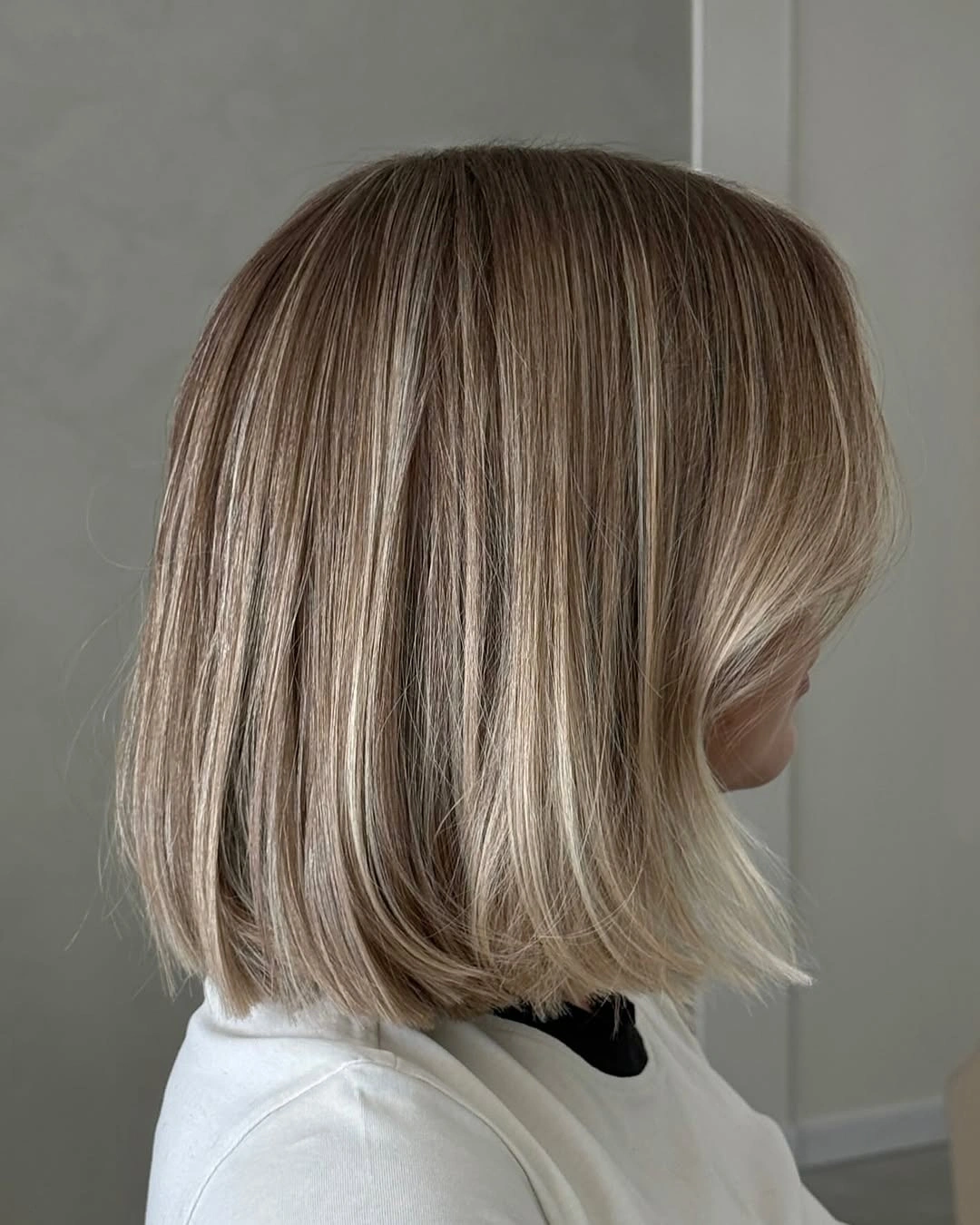 full head babylights blonde on brown hair Cool Blonde Babylights That Make A Classic Bob Shine