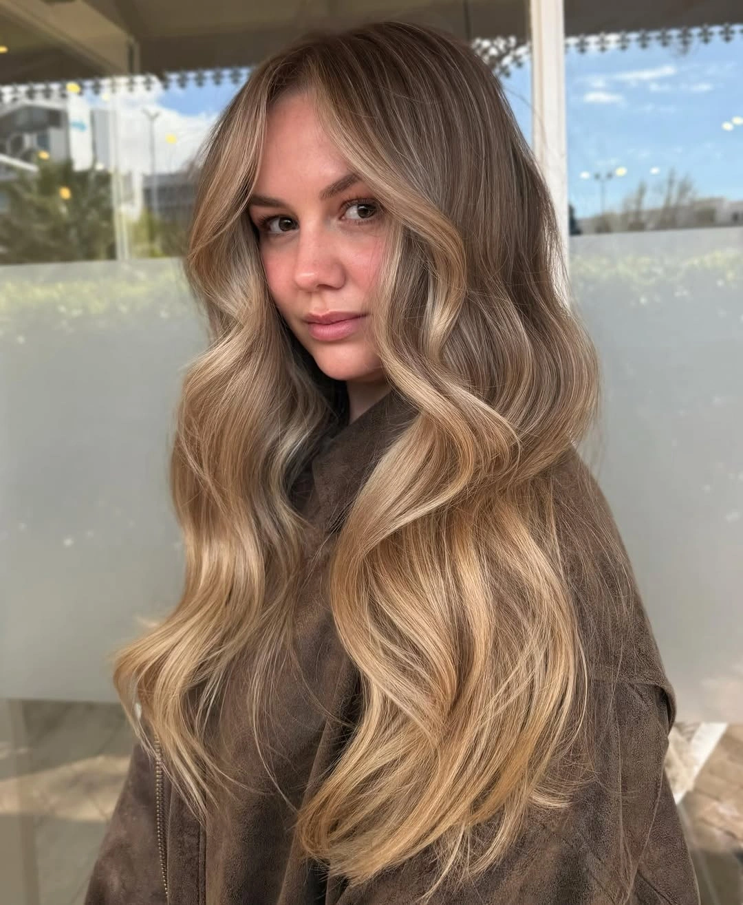full head babylights blonde on brown hair Golden Face Framing Babylights For Soft Everyday Glamour