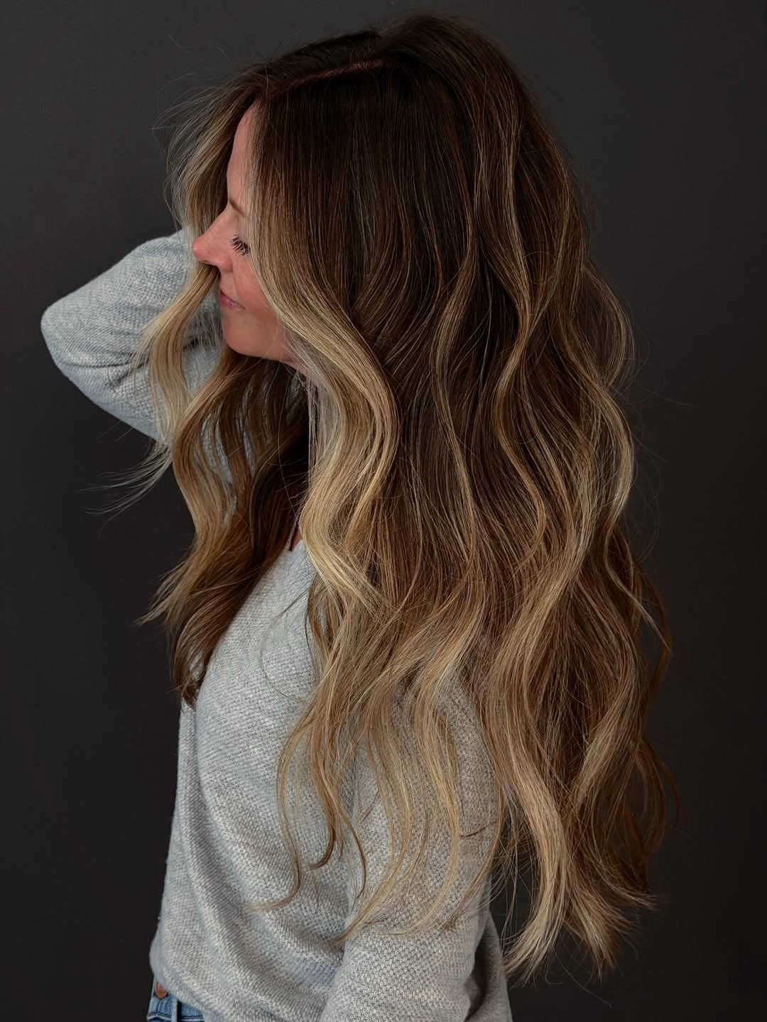 Hair Lowlights Color Ideas and Inspiration Warm Bronde Waves With Natural Dimensional Contrast