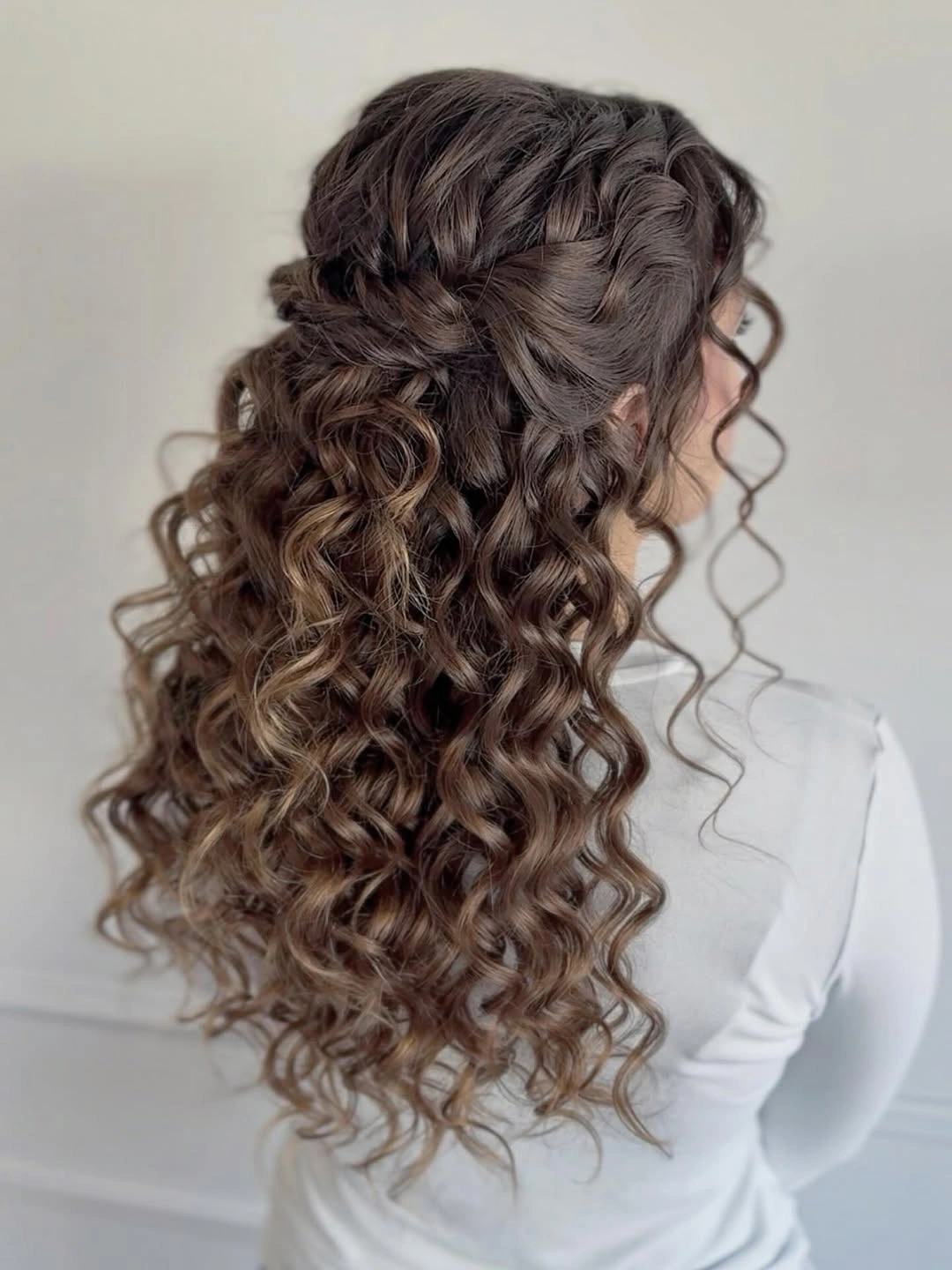 heatless curls hairstyle Defined Corkscrew Curls with a Twisted Half-Up Style