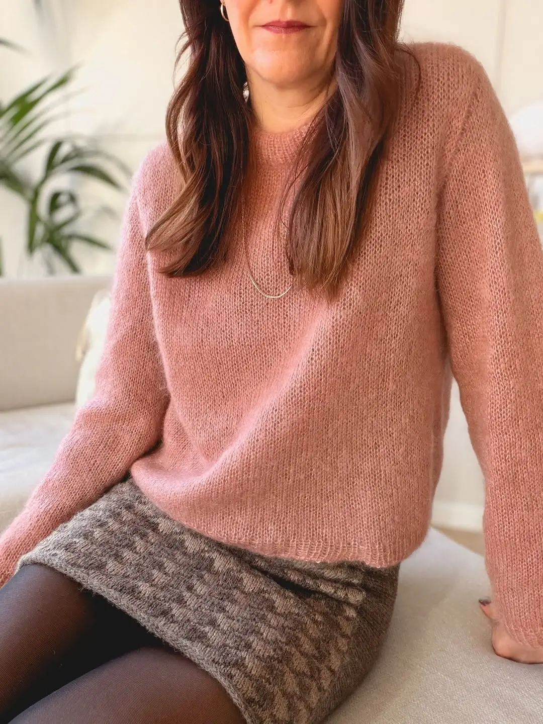 knit skirt outfits fall 2026 Soft Pink Sweater with a Cozy Textured Mini Skirt