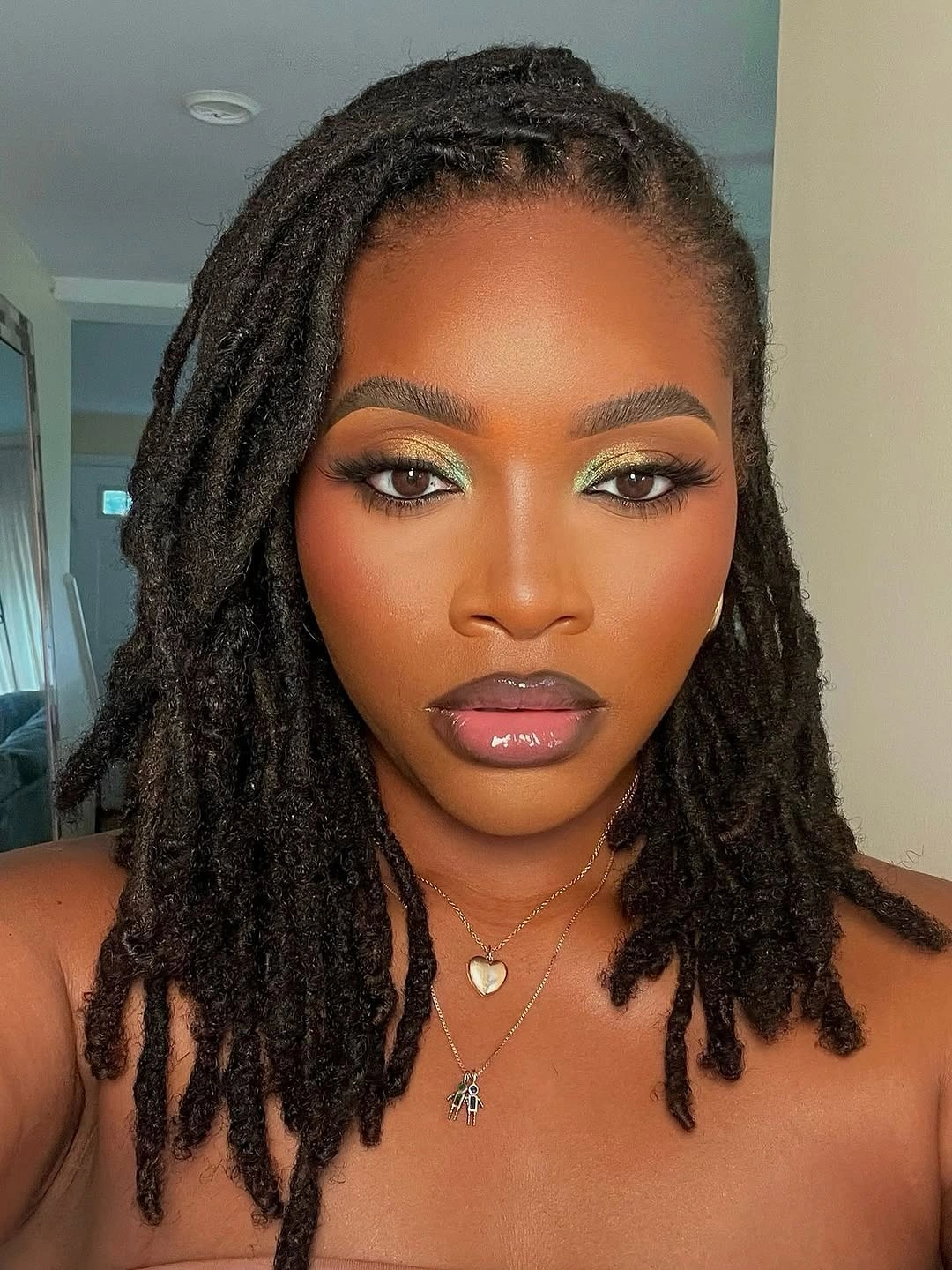 locs hairstyles for black women Soft Shoulder Length Natural Locs With Face Framing Layers