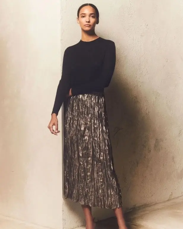 midi skirt fall outfit 2026 Metallic Pleats That Light Up Fall Evenings
