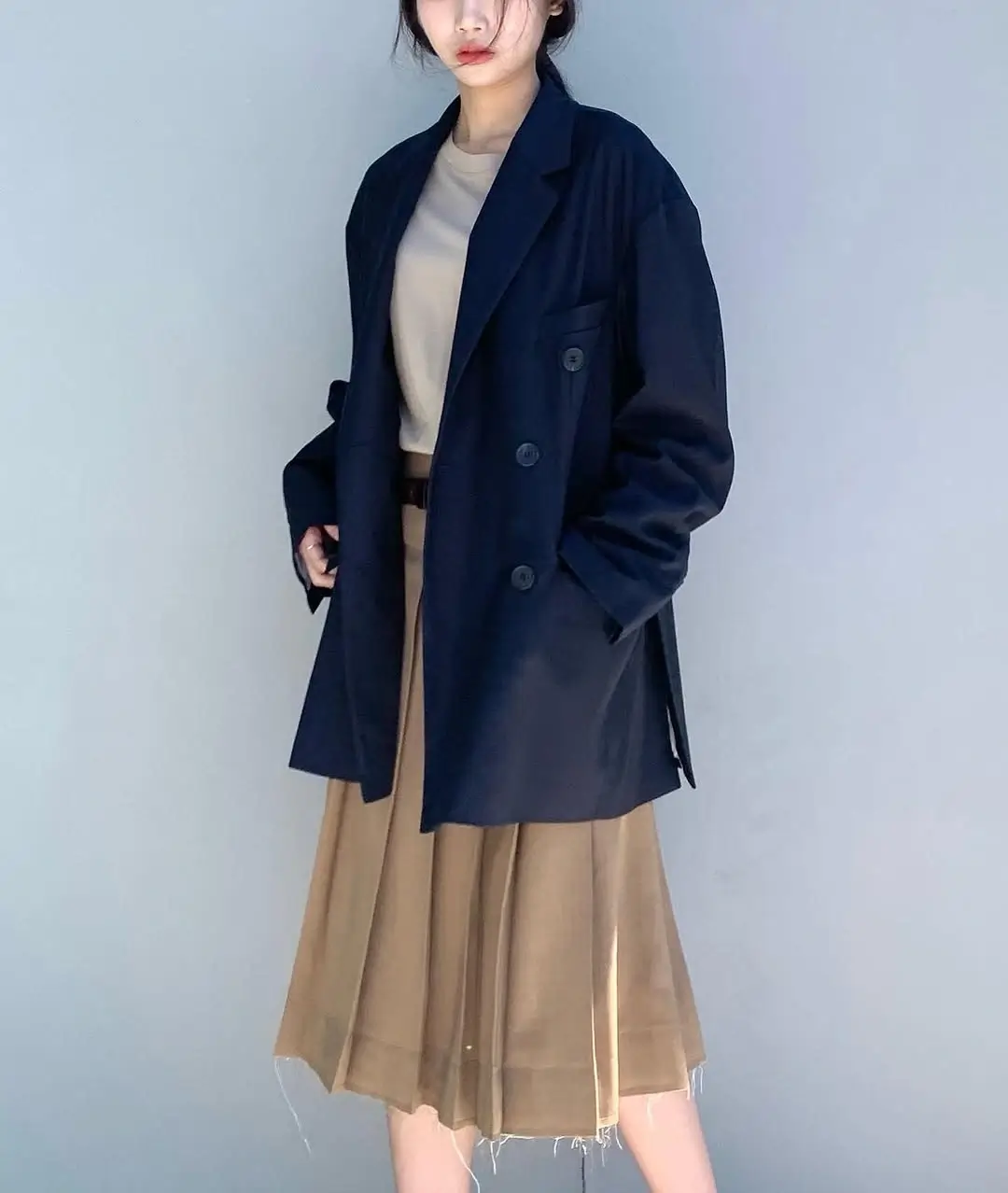 midi skirt fall outfit 2026 Relaxed Tailoring with a Soft Beige Midi