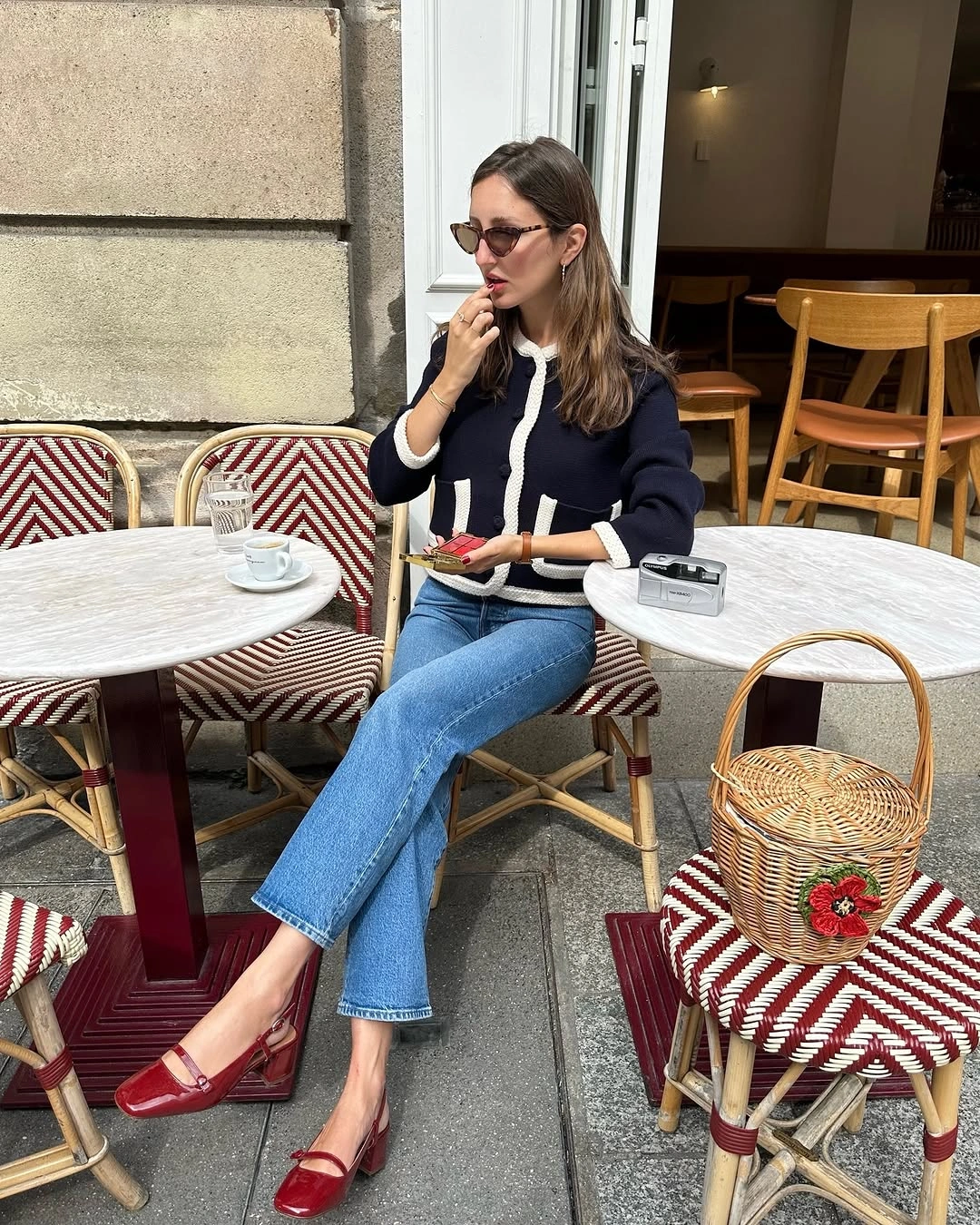 September fashion trends 2026 The Parisian Cardigan and Relaxed Jeans Formula