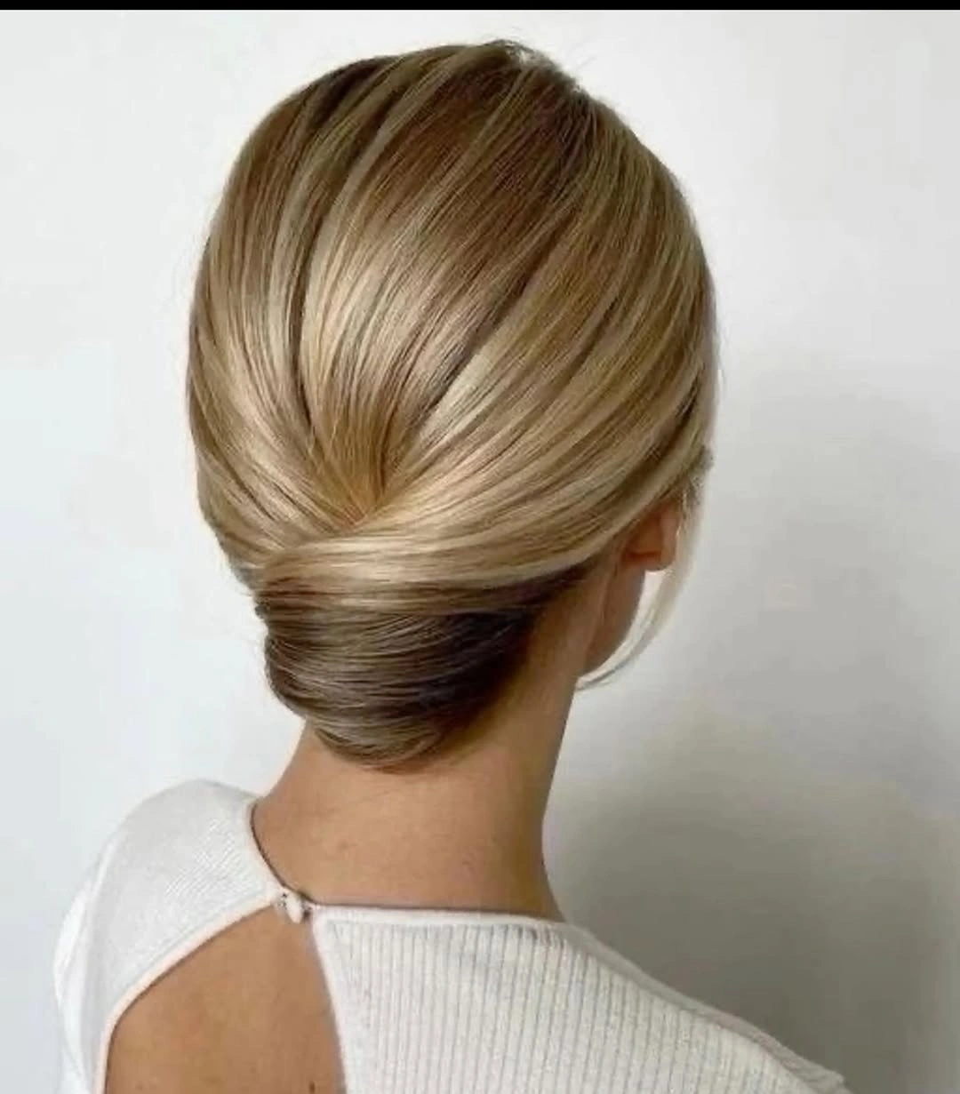 September hairstyles ideas 2026 A Timeless Low Chignon That Never Goes Out of Style
