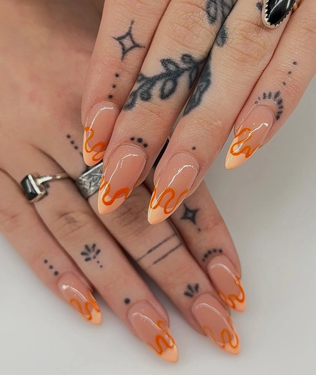 September nail designs 2026 Modern Orange French Tips with Flowing Details