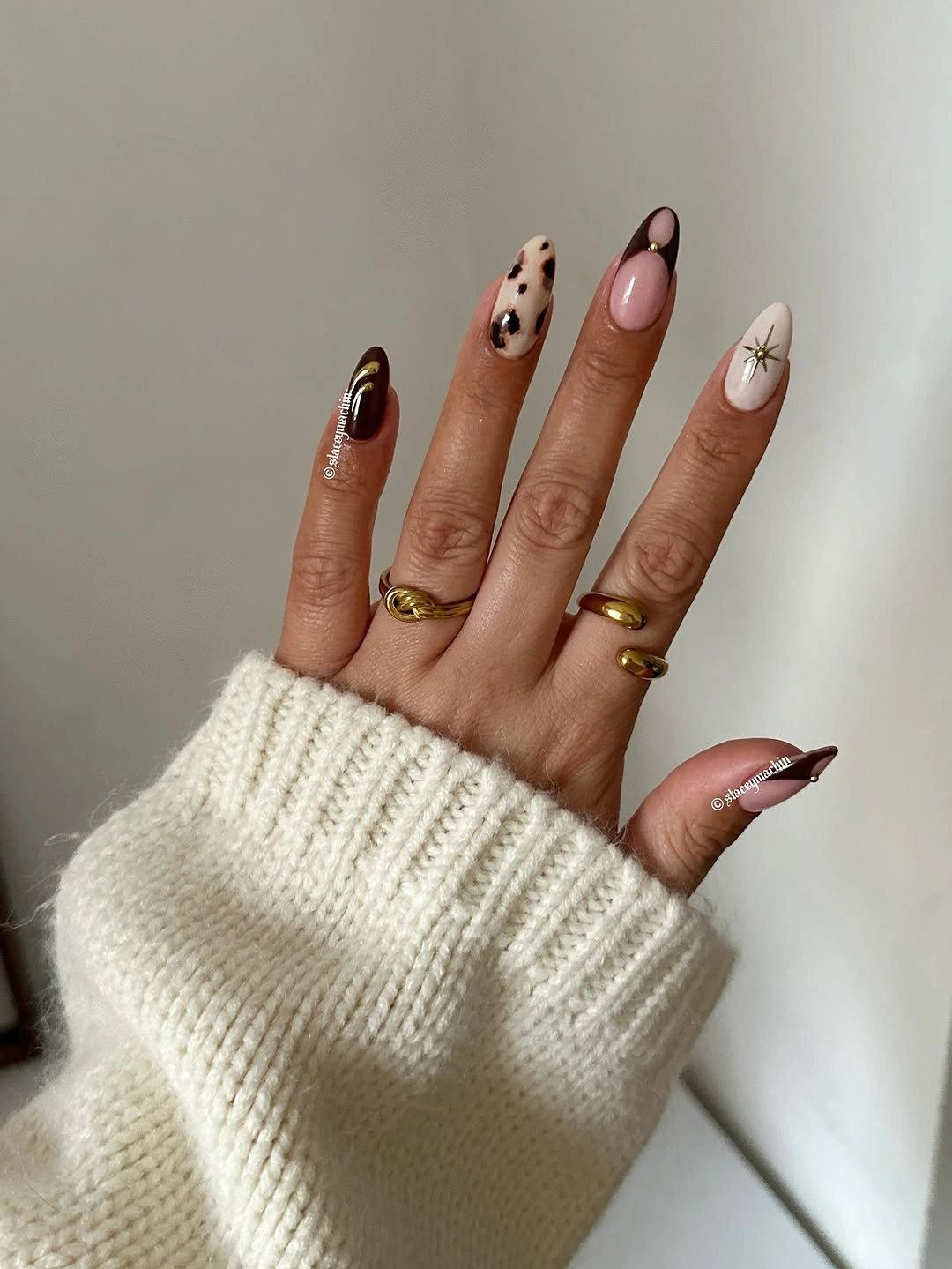 September nail designs 2026 Elegant Mocha French Tips with Chic Animal Print