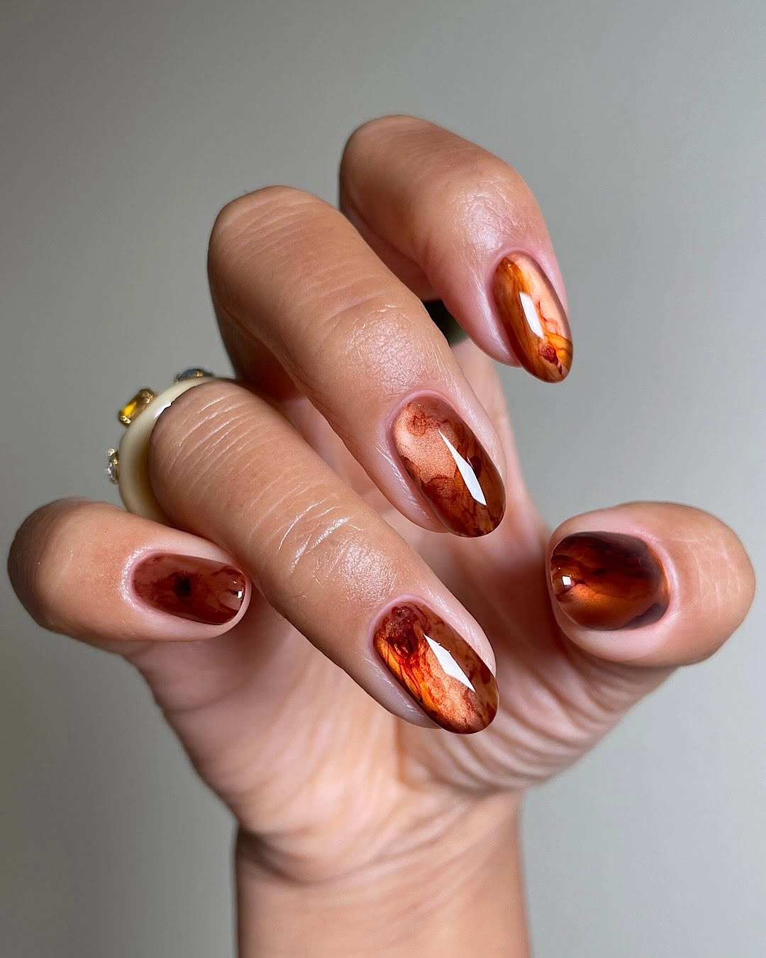 September nails color 2026 Amber Glass Nails With a Luxurious Tortoiseshell Finish