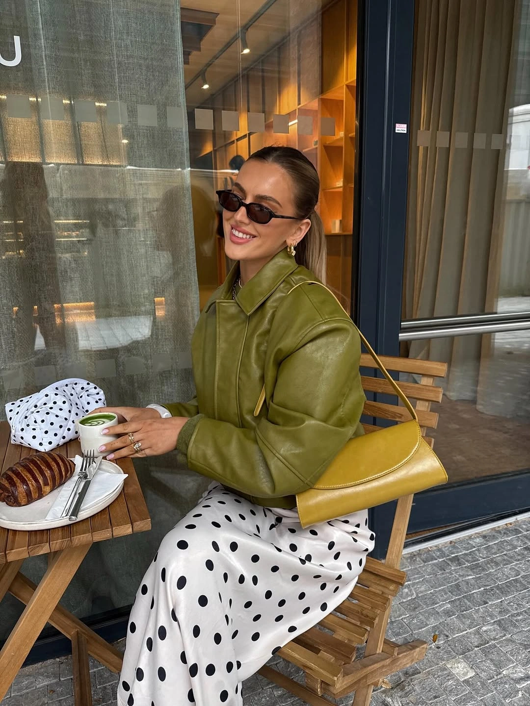 September outfits ideas 2026 Olive Leather and Polka Dots Create a Modern Statement